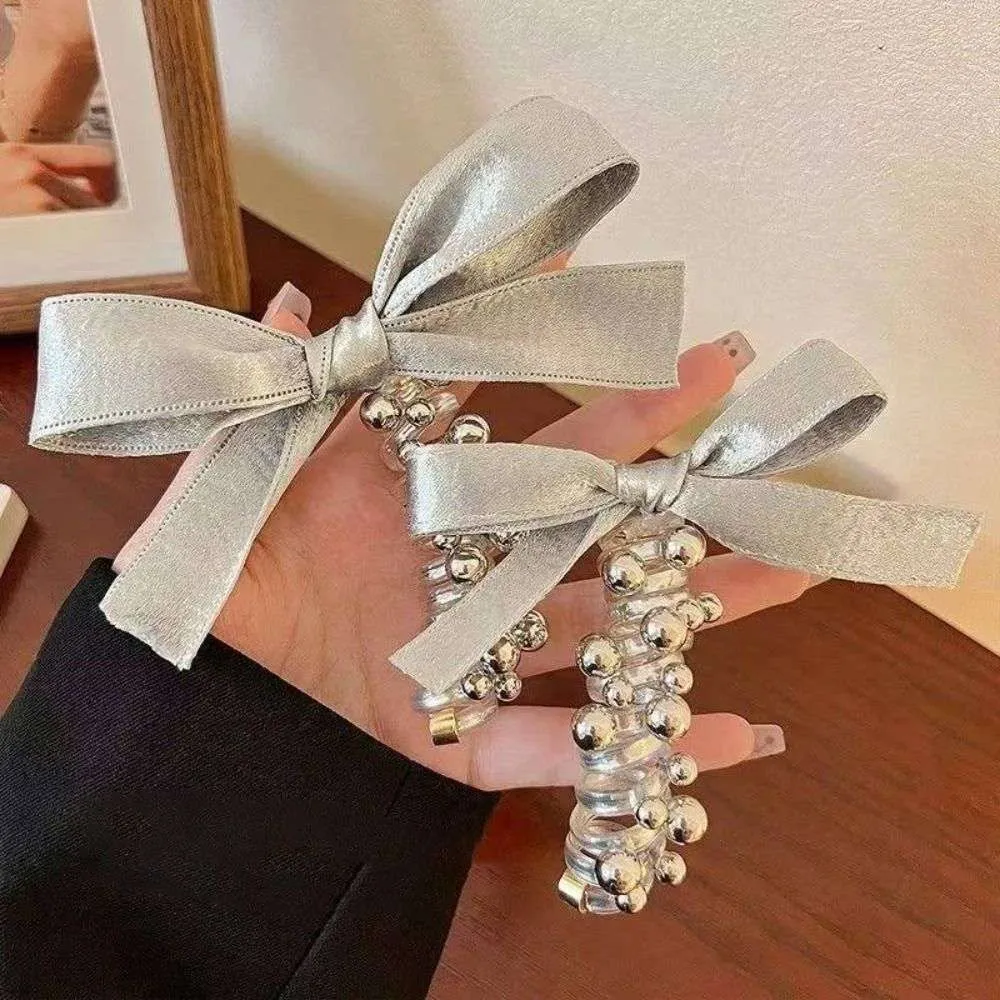 Elastic Bow Spiral Hair Ties – Shiny Braided Bowknot Ponytail Holders, Silvery Telephone Wire Hairbands for Girls & Teens(1 Pc) - Detailed Feature View 1