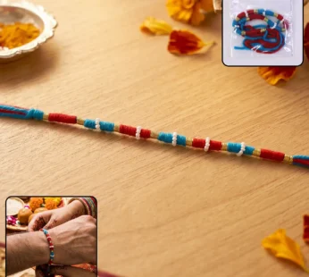 Handmade Pearl Beaded Rakhi – Elegant Traditional Gifting