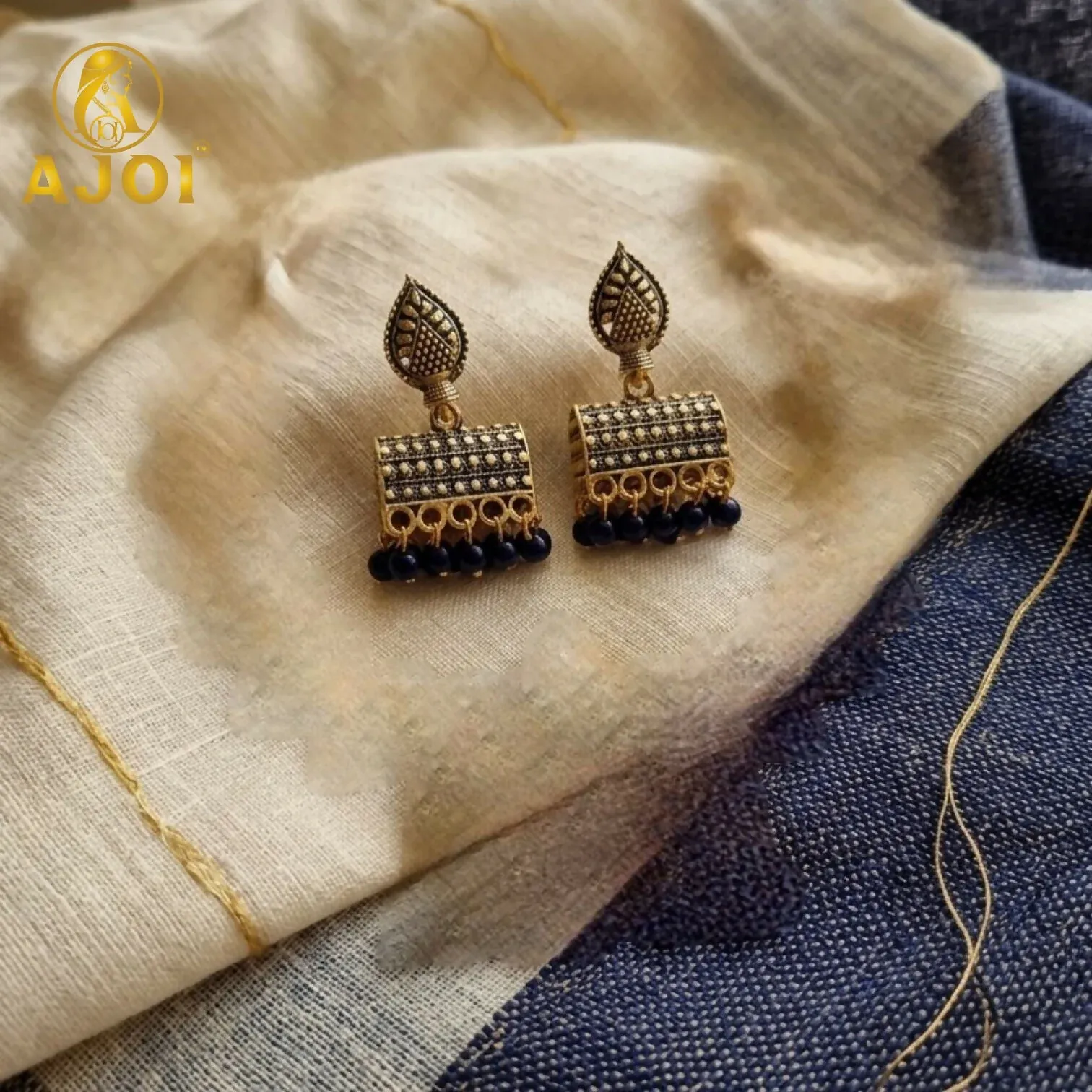Antique Gold-Plated Leaf Design Jhumka Earrings with Blue Beads - Detailed Feature View 2