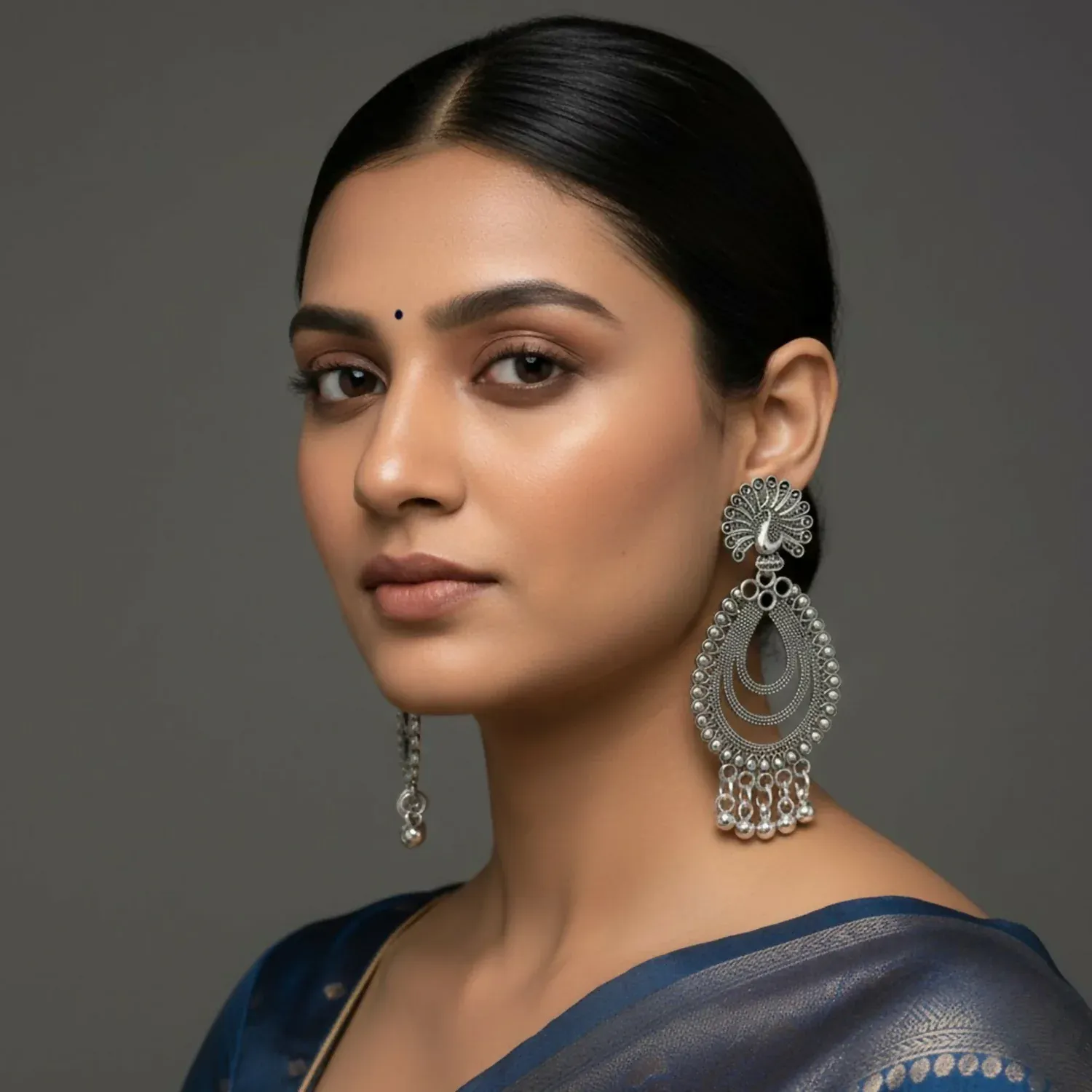 Elegant Peacock Silver Finish Jhumka Earrings for Festive Wear - Detailed Feature View 1