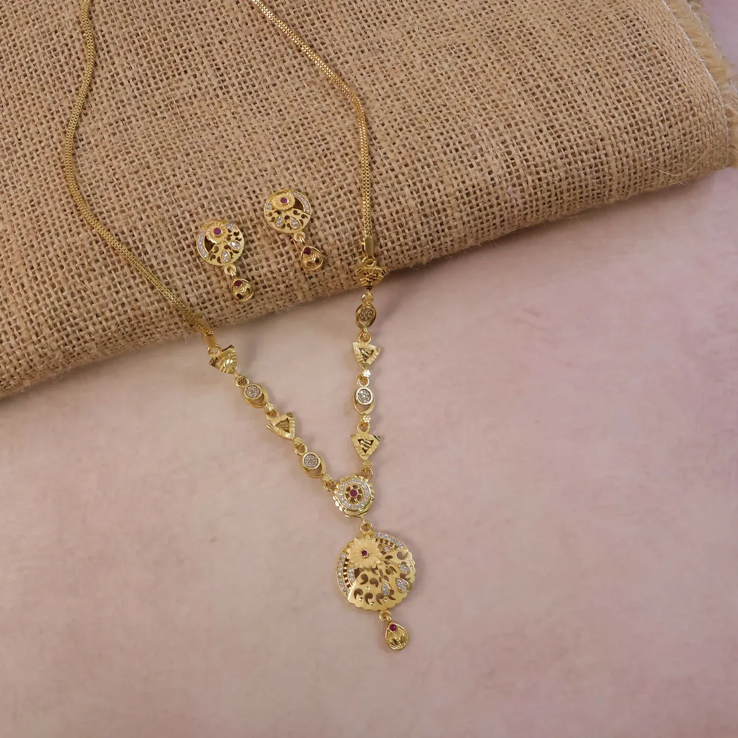 Classic Gold-Tone Floral Engraved Pendant Necklace Set with Designer Stud Earrings - Detailed Feature View 1