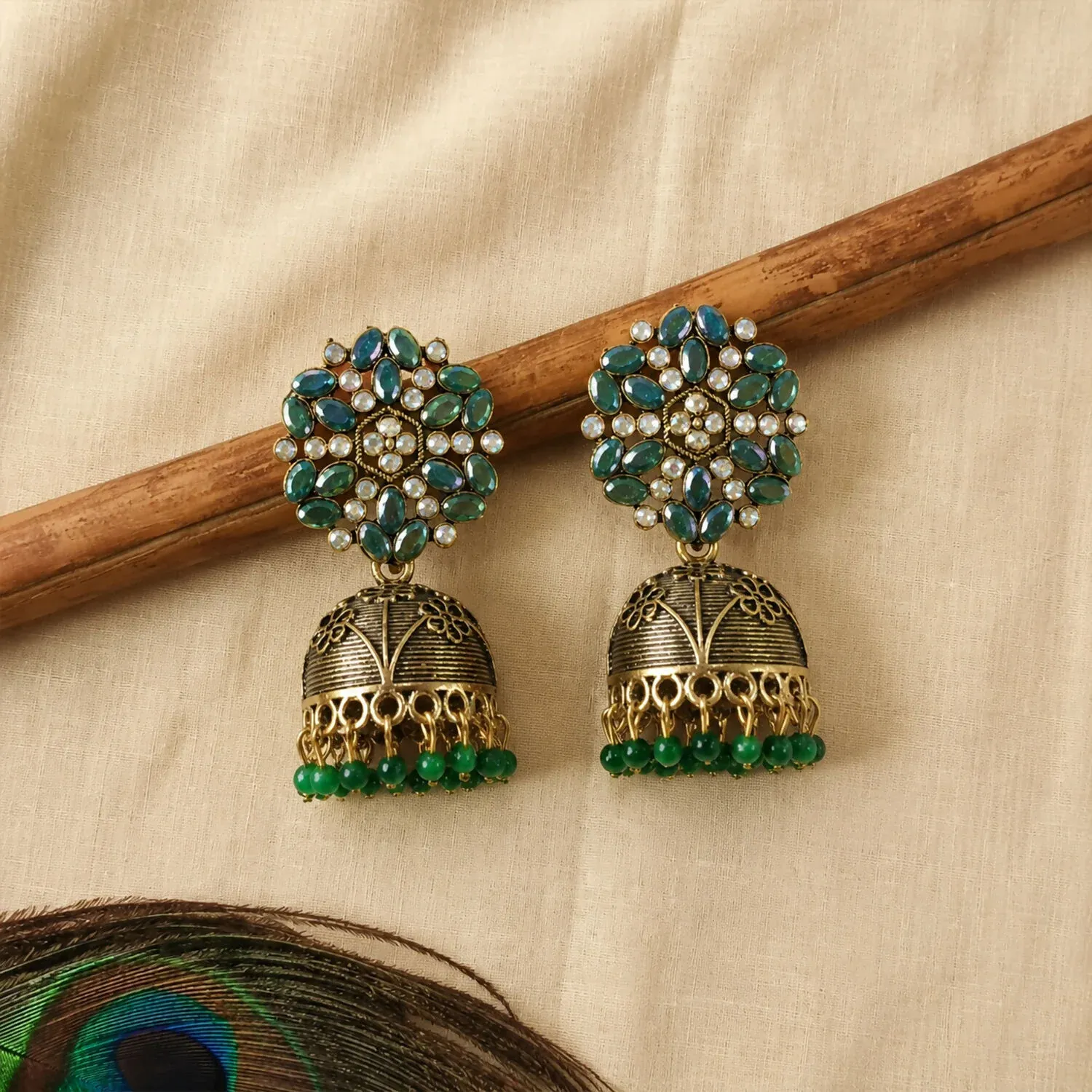 Antique Golden Jhumka Earrings with Green Stone Floral Top - Detailed Feature View 1
