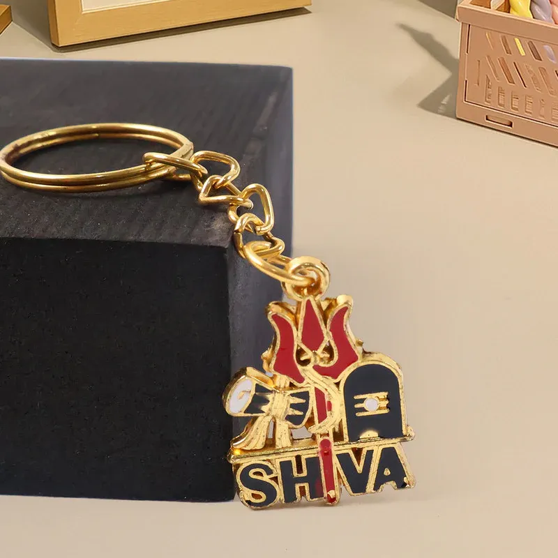 Golden Shiva Symbol Keychain with Trishul & Damru – Devotional Gift - Detailed Feature View 1