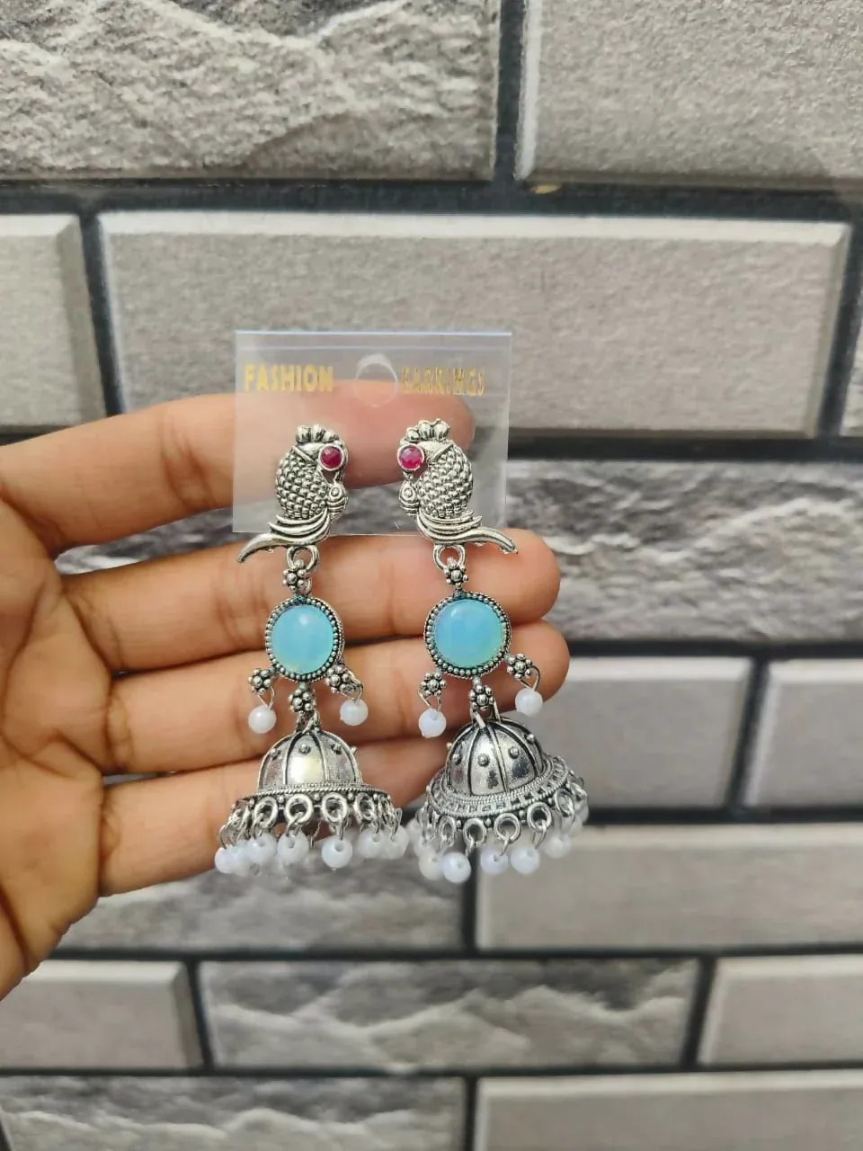 Elegant Peacock Oxidized Silver Jhumka Earrings with Sky Blue Stone & Pearl Accents - Detailed Feature View 4