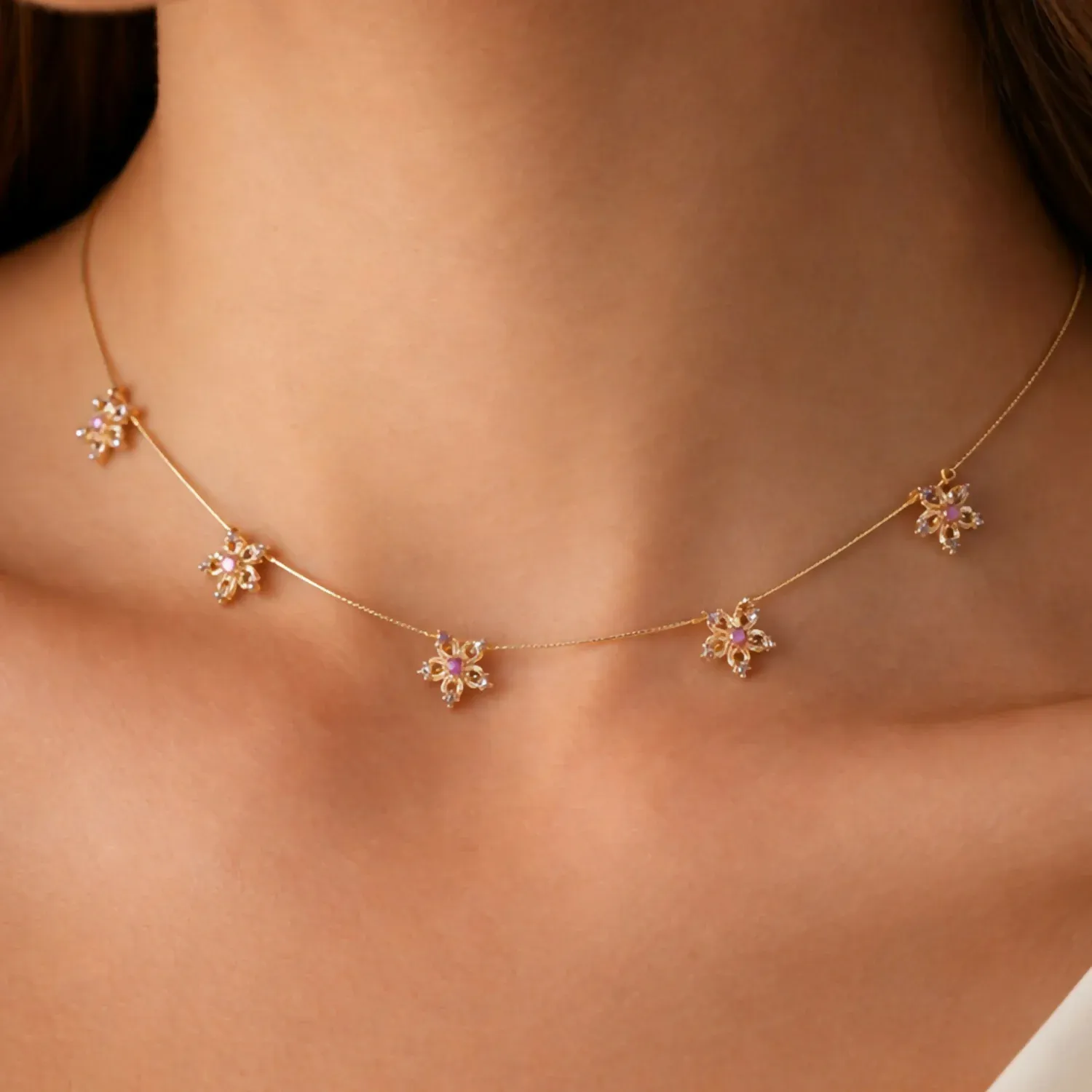 Minimalist Gold Chain Necklace with Floral Star Design & Red White Stones - Detailed Feature View 1