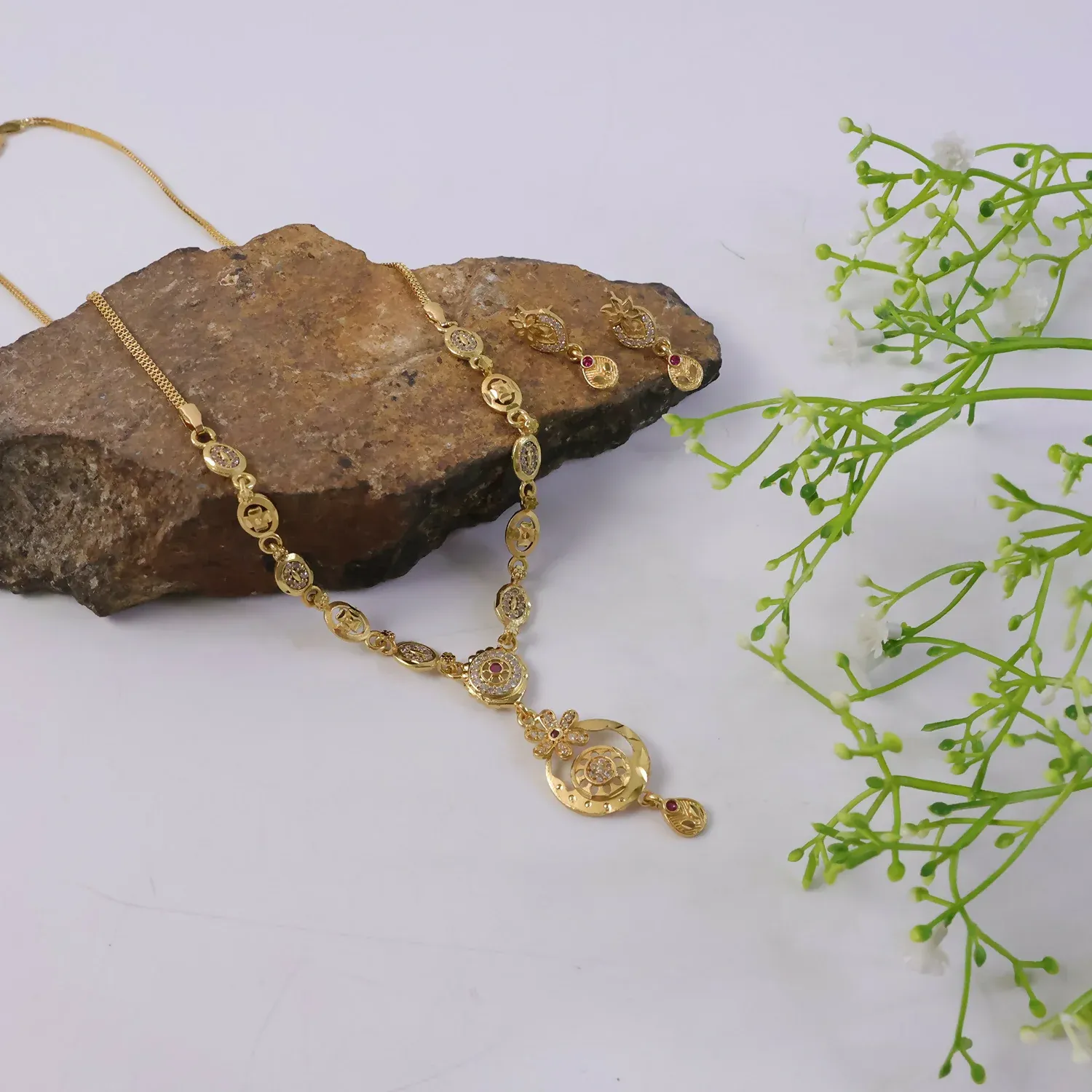 Stylish Gold-Tone Circular Pendant Necklace Set with Floral Accent & Matching Earrings - Detailed Feature View 4