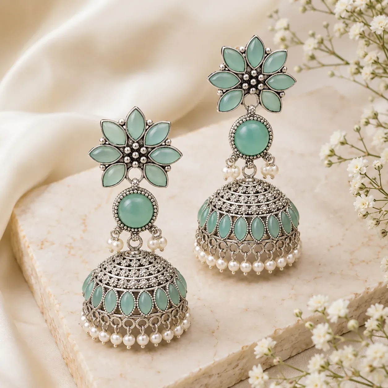 Elegant Oxidized Silver Jhumka Earrings with Sky Blue Stones & Pearl Accents - Detailed Feature View 3