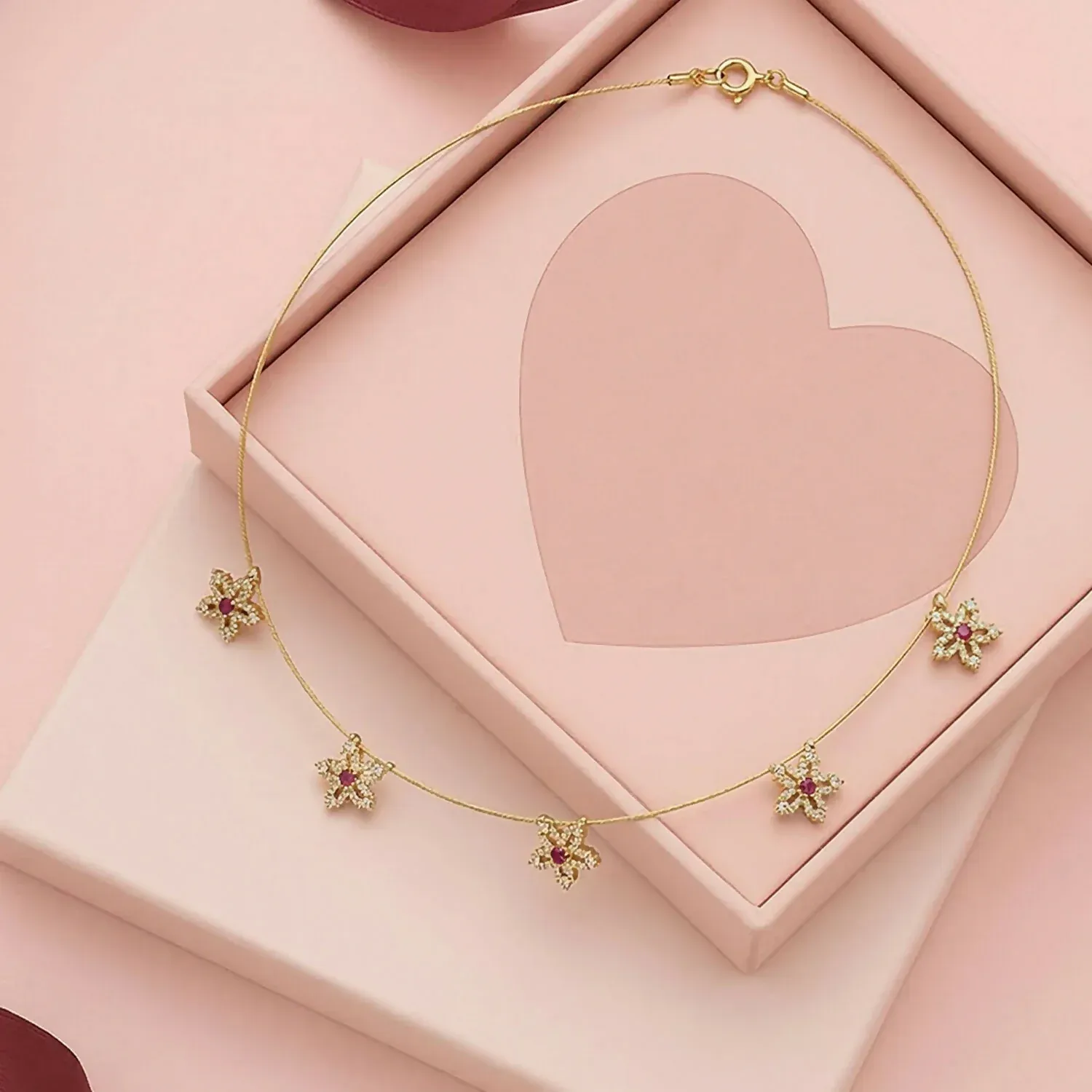 Minimalist Gold Chain Necklace with Floral Star Design & Red White Stones - Detailed Feature View 2