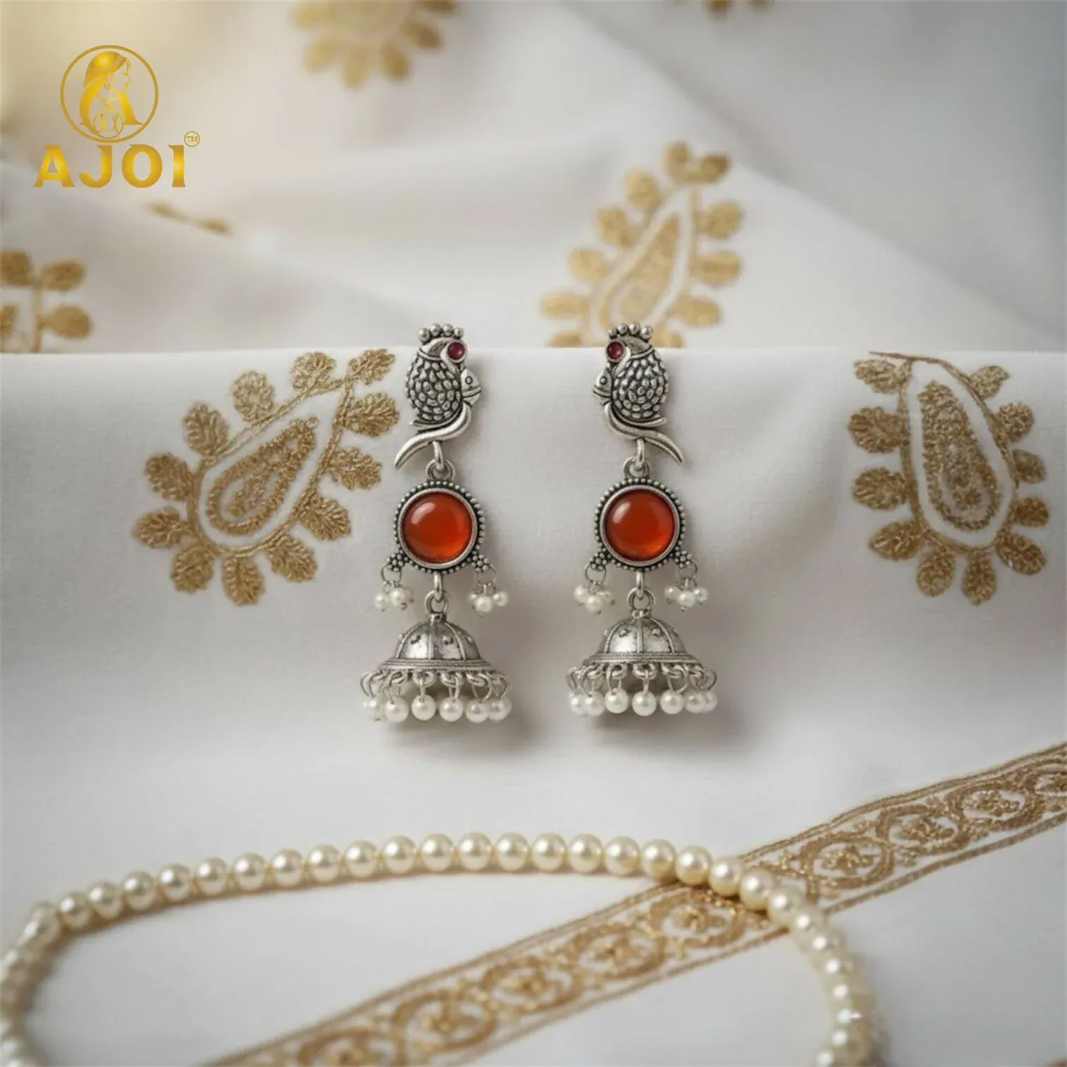 Premium Antique Silver Peacock Jhumka Earrings with Red Stone Centerpiece & Pearl Drops - Buy Online at Alikart