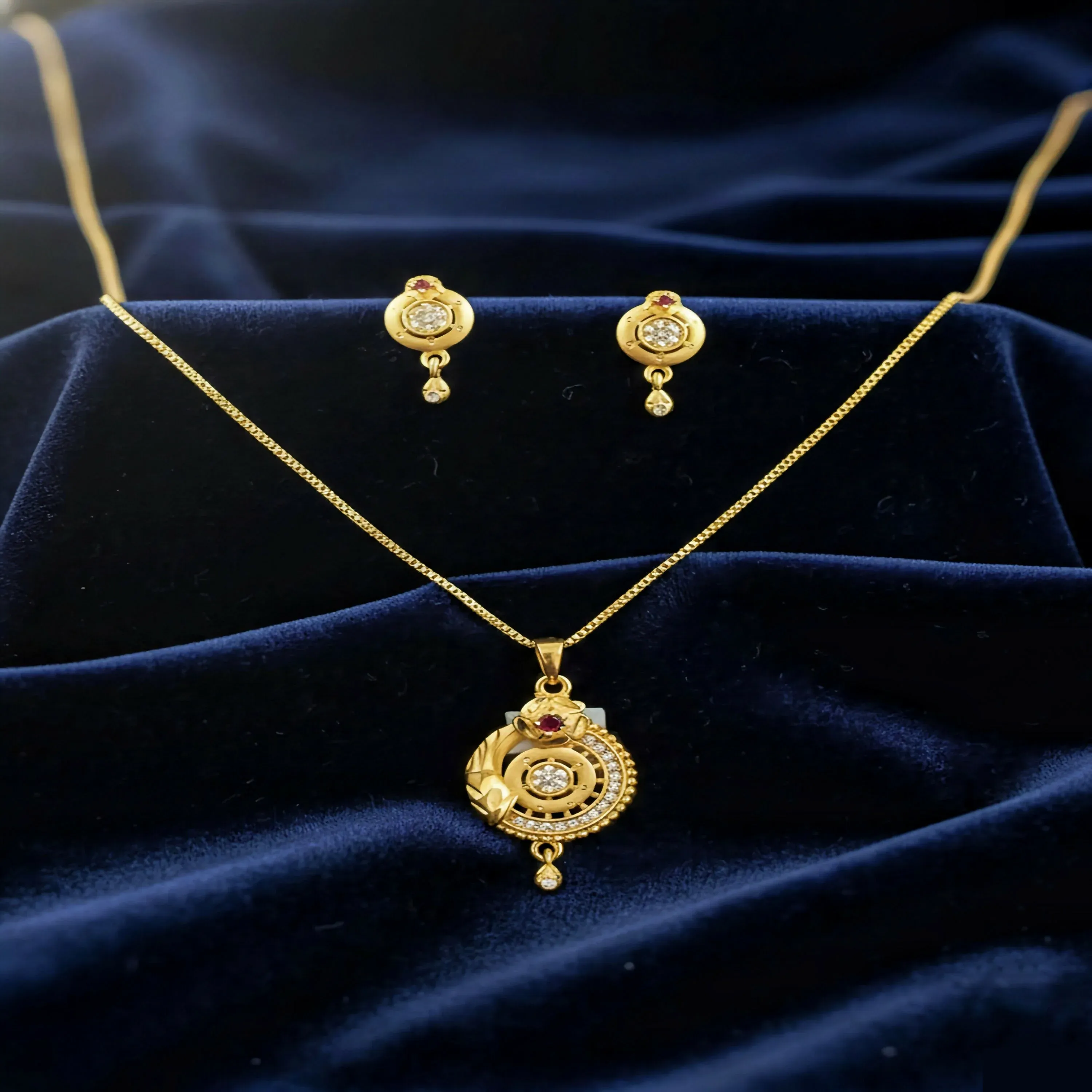 Gold-Plated Circular Pendant Necklace with Matching Drop Earrings – Floral Diamond & Ruby Accents - Detailed Feature View 1
