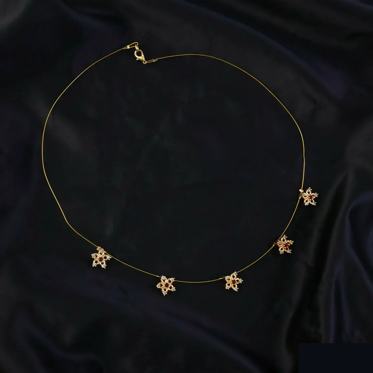 Minimalist Gold Chain Necklace with Floral Star Design & Red White Stones - Detailed Feature View 4