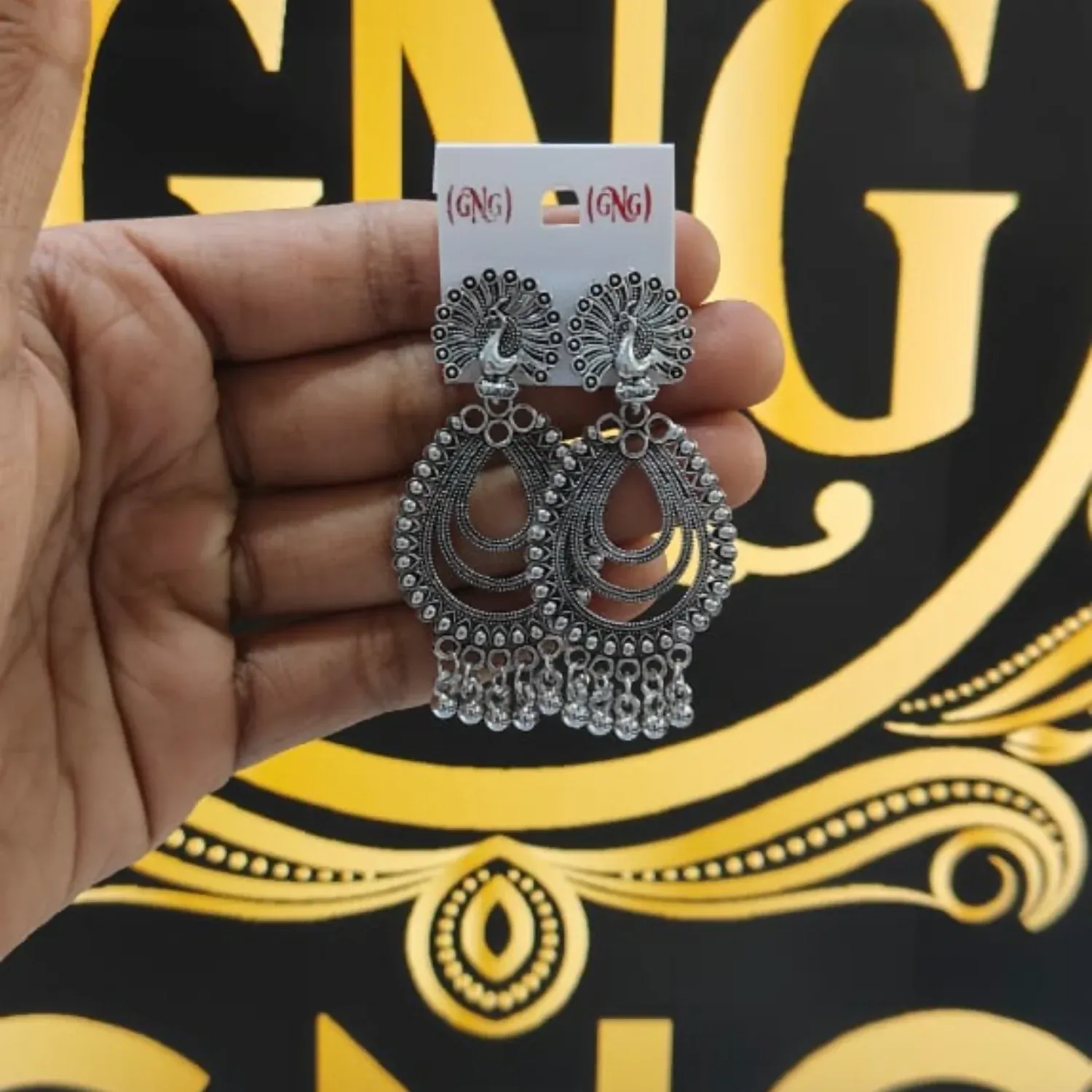 Elegant Peacock Silver Finish Jhumka Earrings for Festive Wear - Detailed Feature View 3