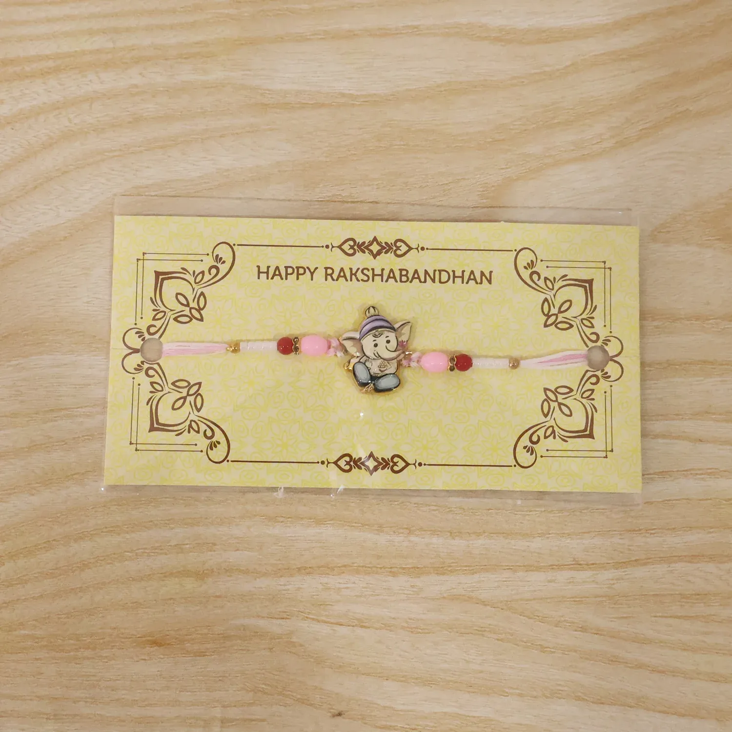 Ganesha Rakhi – Beautiful Pink and Red Beads for Raksha Bandhan - Detailed Feature View 7