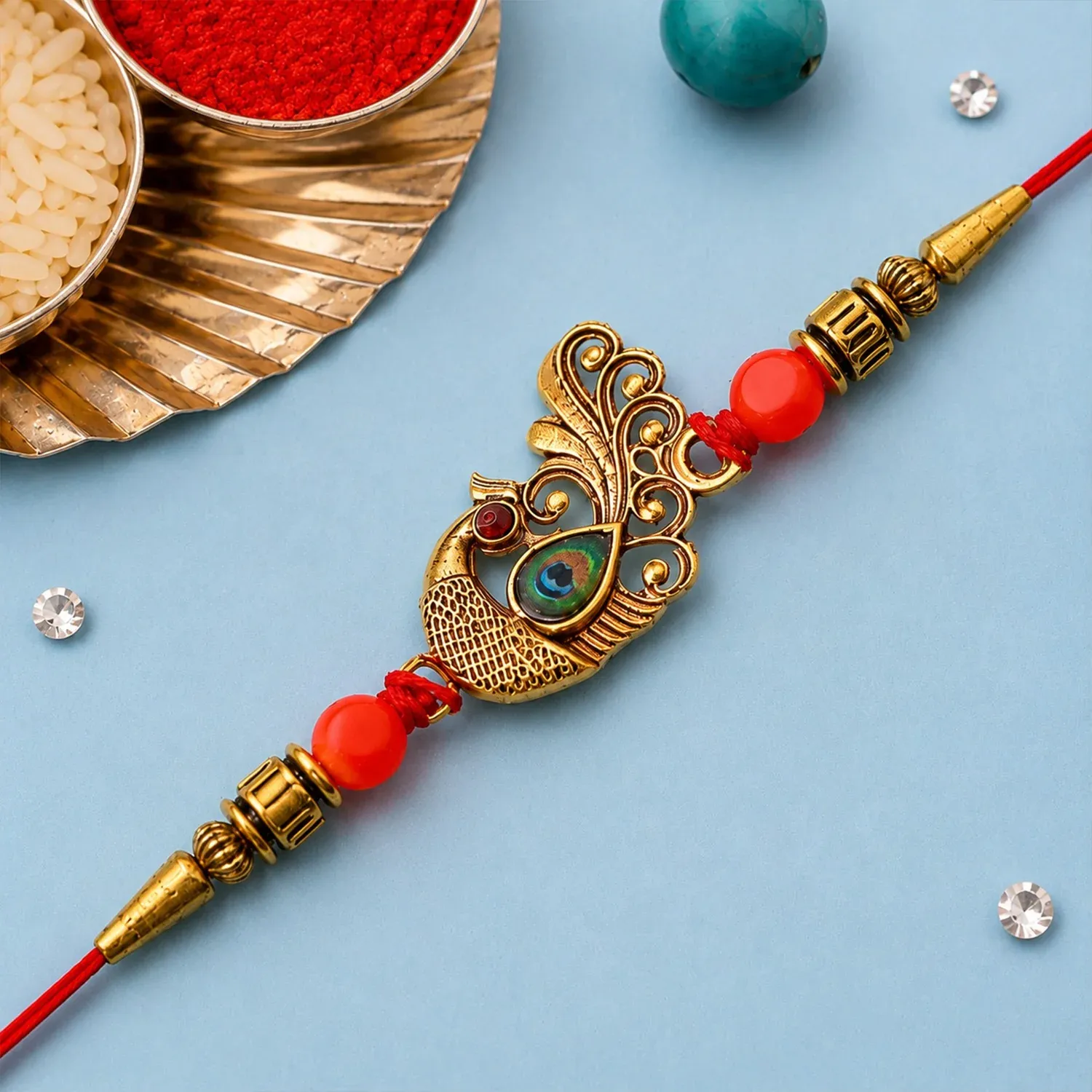 Premium Peacock Rakhi – Golden Stone & Bead Designer Band for Brother - Buy Online at Alikart