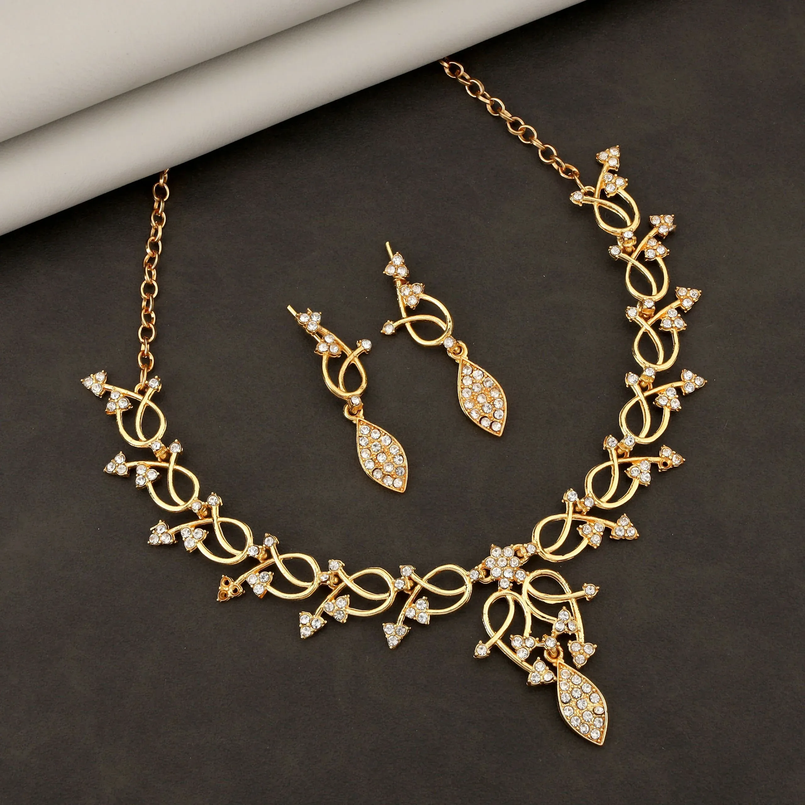 Premium Gold-Toned Ruby & American Diamond Necklace Set – Elegant Vine Design - Buy Online at Alikart
