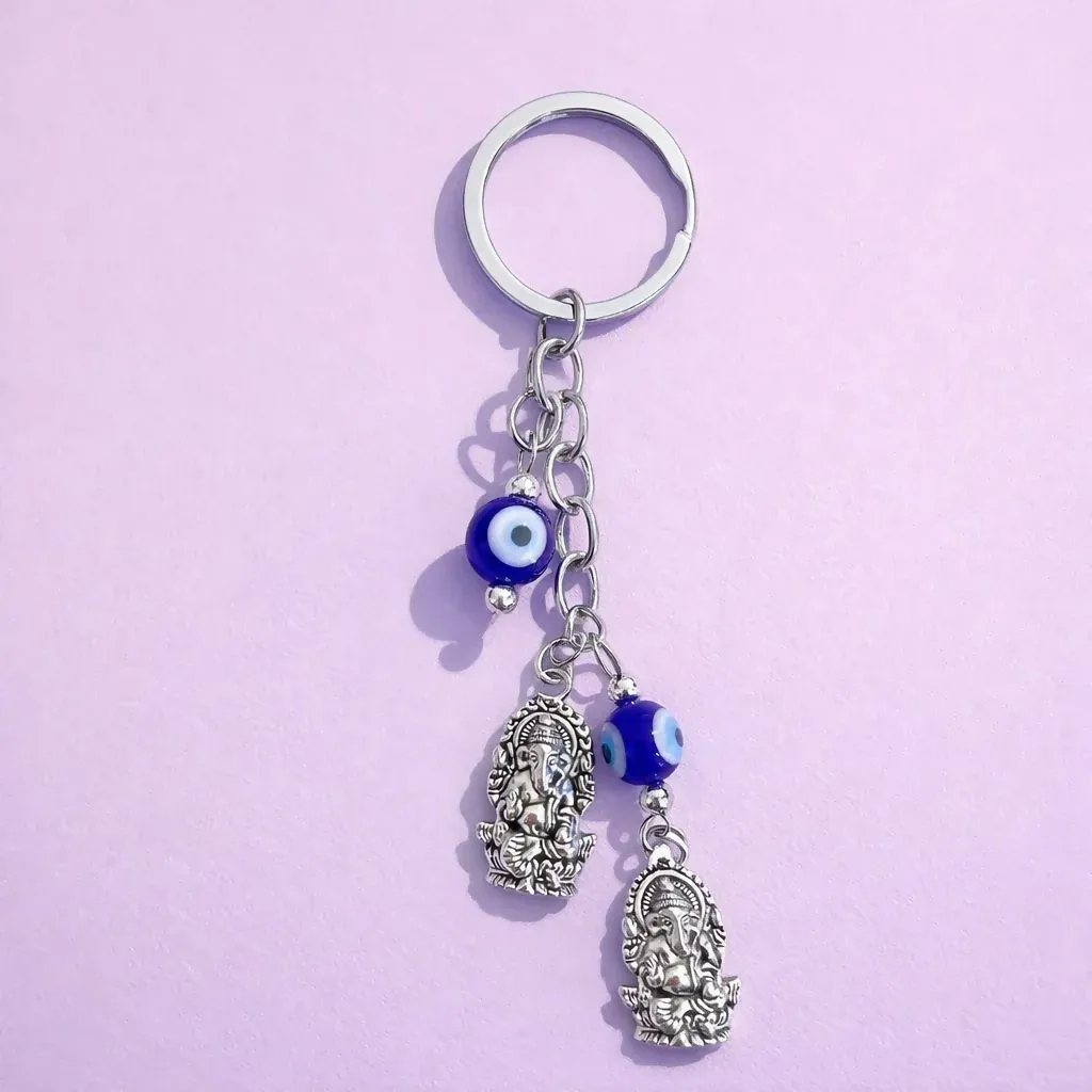Premium Ganesh Evil Eye Keychain – Stylish Protection for Keys & Bags - Buy Online at Alikart