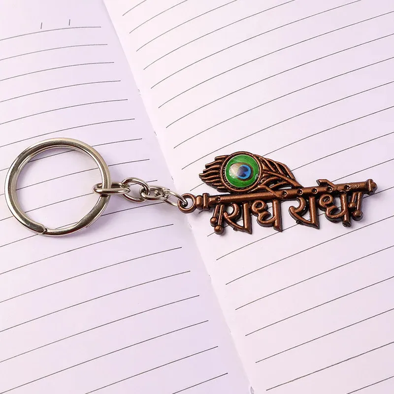 Radhe Radhe Metal Keychain – Elegant Copper Finish & Peacock Design - Detailed Feature View 2