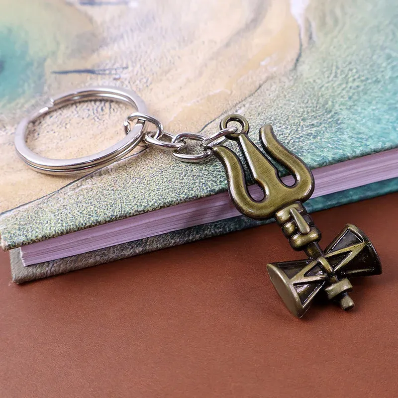 Premium Trishul Damru Keychain – Durable Antique Finish Spiritual Accessory - Buy Online at Alikart
