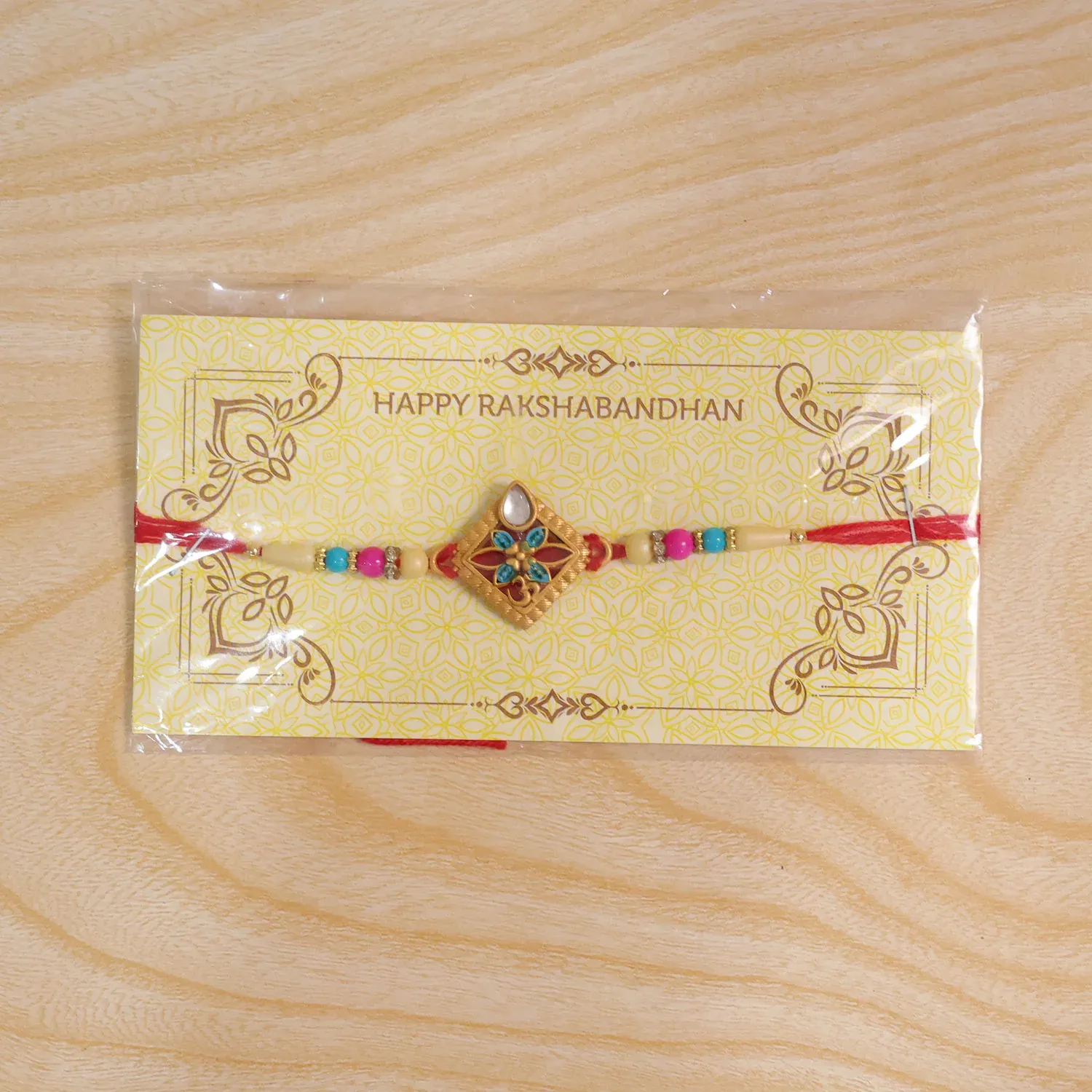 Diamond Shape Rakhi with Stone Embellishments and Beads - Detailed Feature View 5