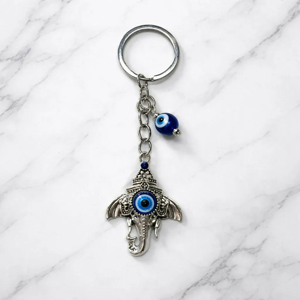 Premium Ganesh Evil Eye Keychain – Spiritual Protection for Keys & Bags - Buy Online at Alikart