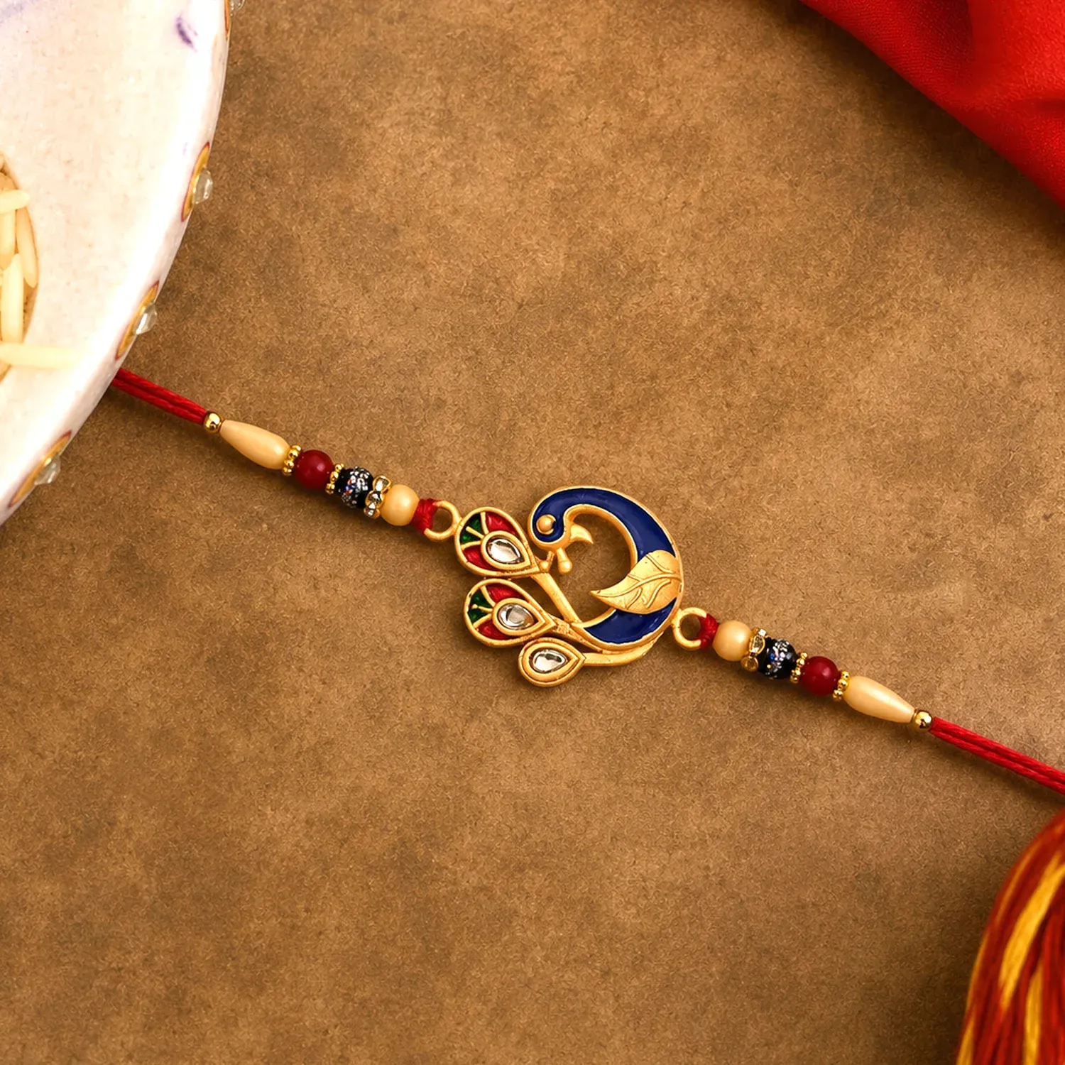Peacock Meenakari Rakhi – Vibrant Traditional Thread for Brother - Detailed Feature View 1