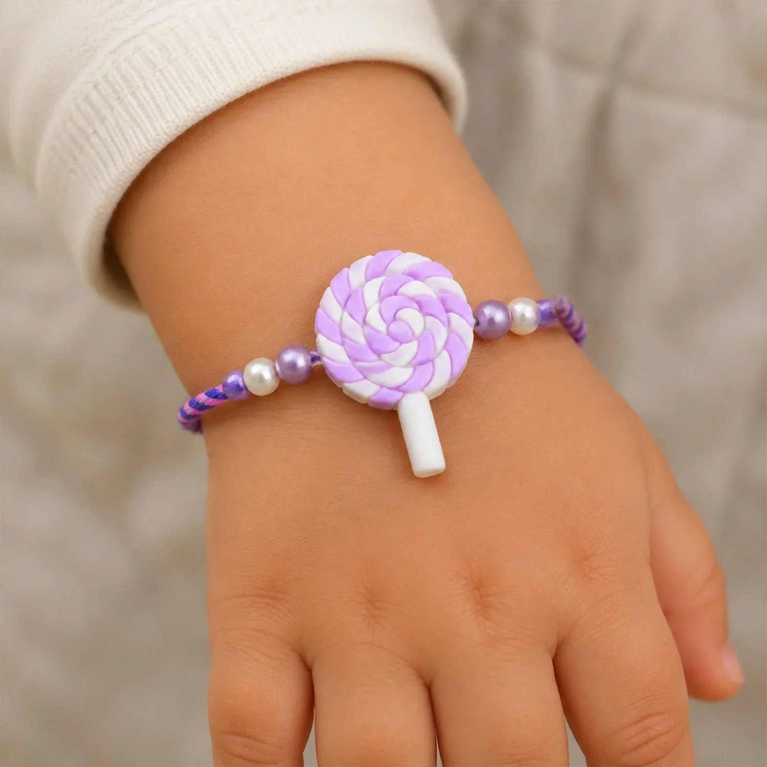 Kids Rakhi for Brother – Swirl Lollipop Pearl Beaded Design - Detailed Feature View 1