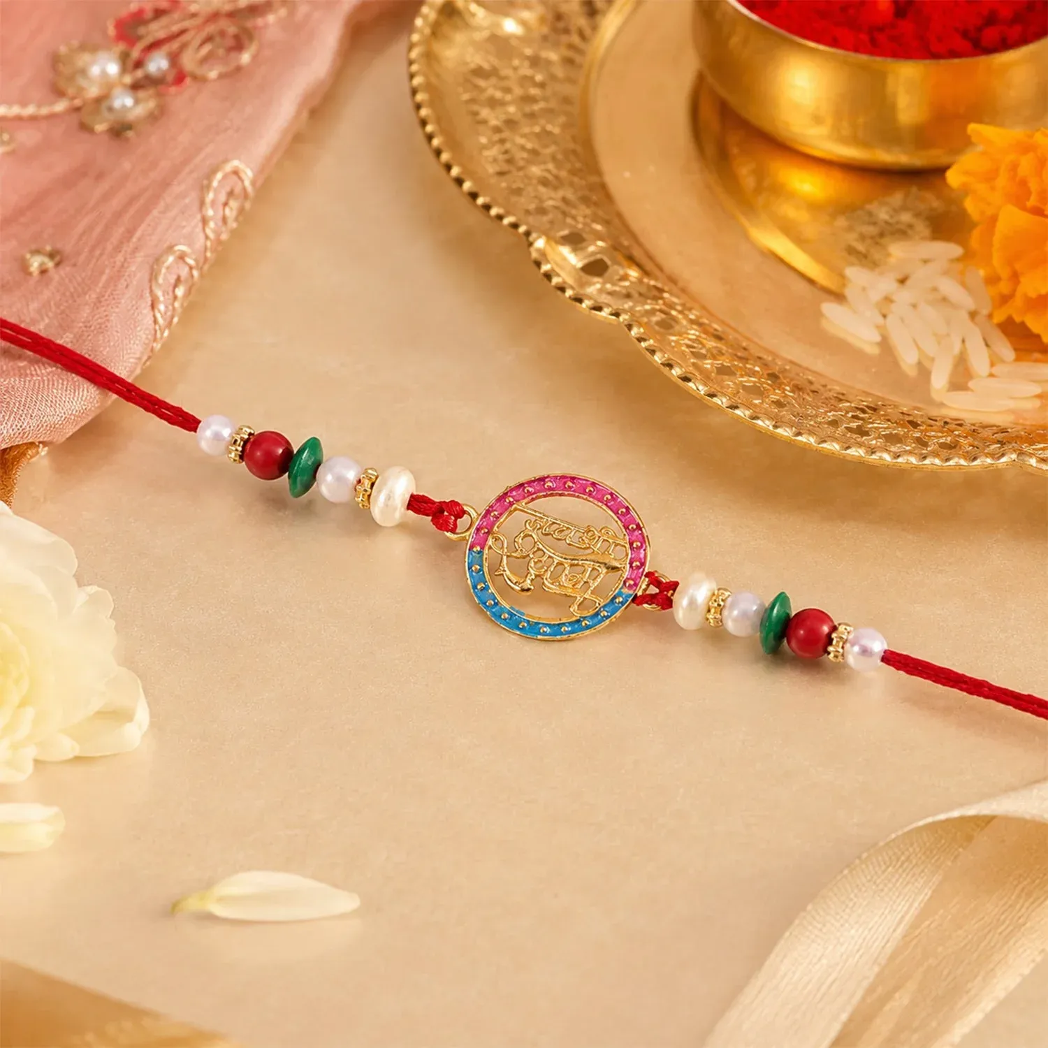 Rakhi – Traditional thread with pearls & divine Hindi text - Detailed Feature View 2