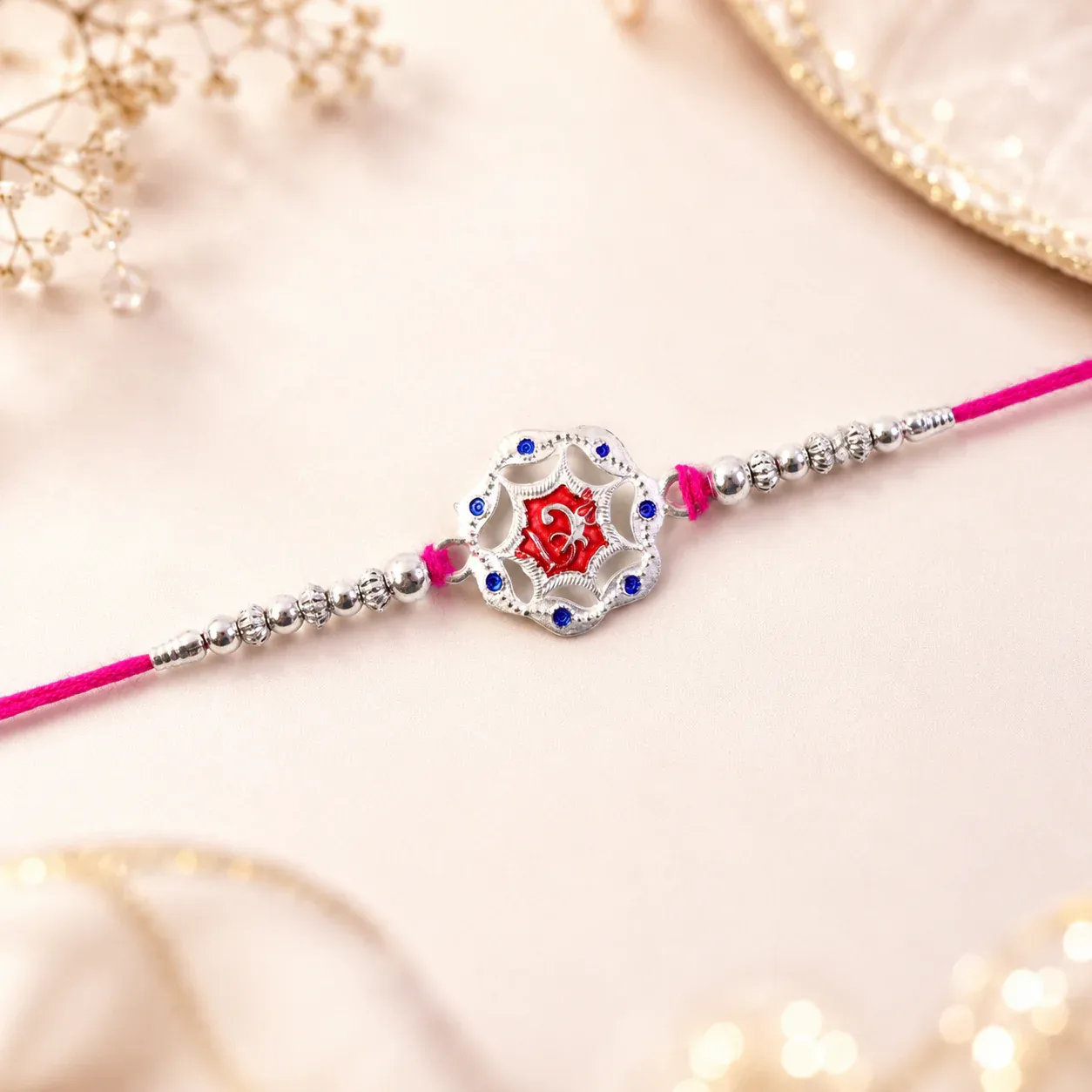 Designer Rakhi for Brother – Silver Floral with Red Stone - Detailed Feature View 1