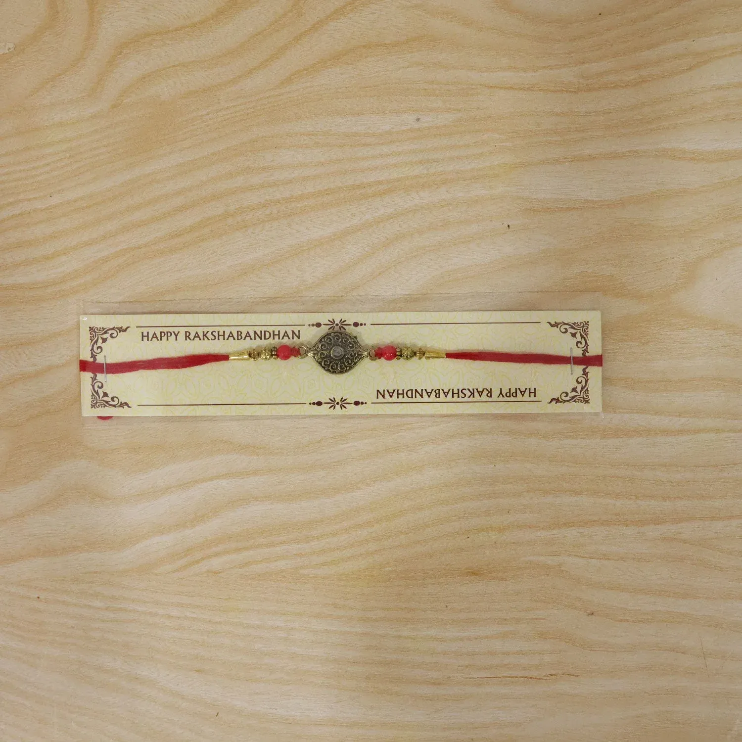 Rakhi – Elegant Antique Oval with Red Crystal Beads for Brothers - Detailed Feature View 5