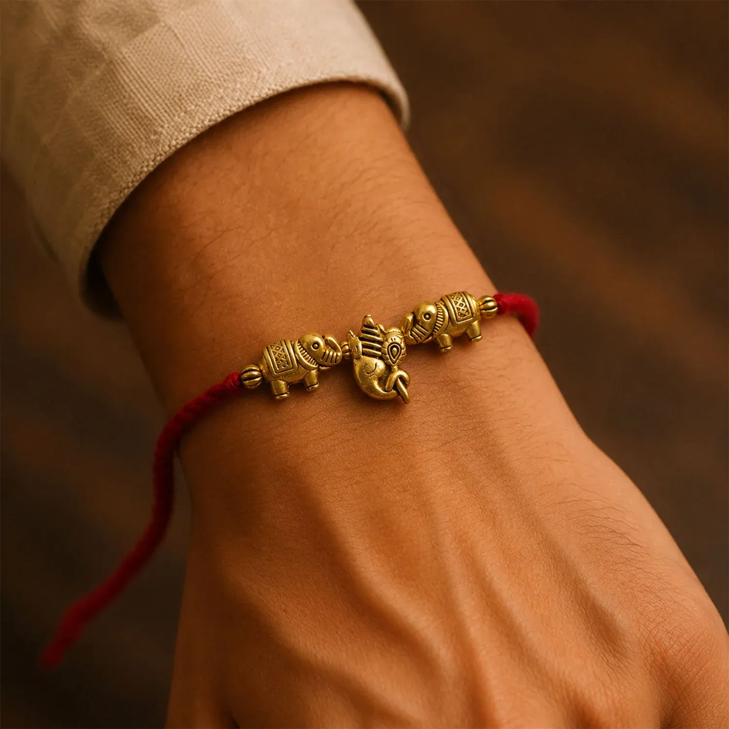 Premium Elephant Design Om Ganesha Antique Charm Fancy Thread Rakhi for Brother - Detailed Feature View 1