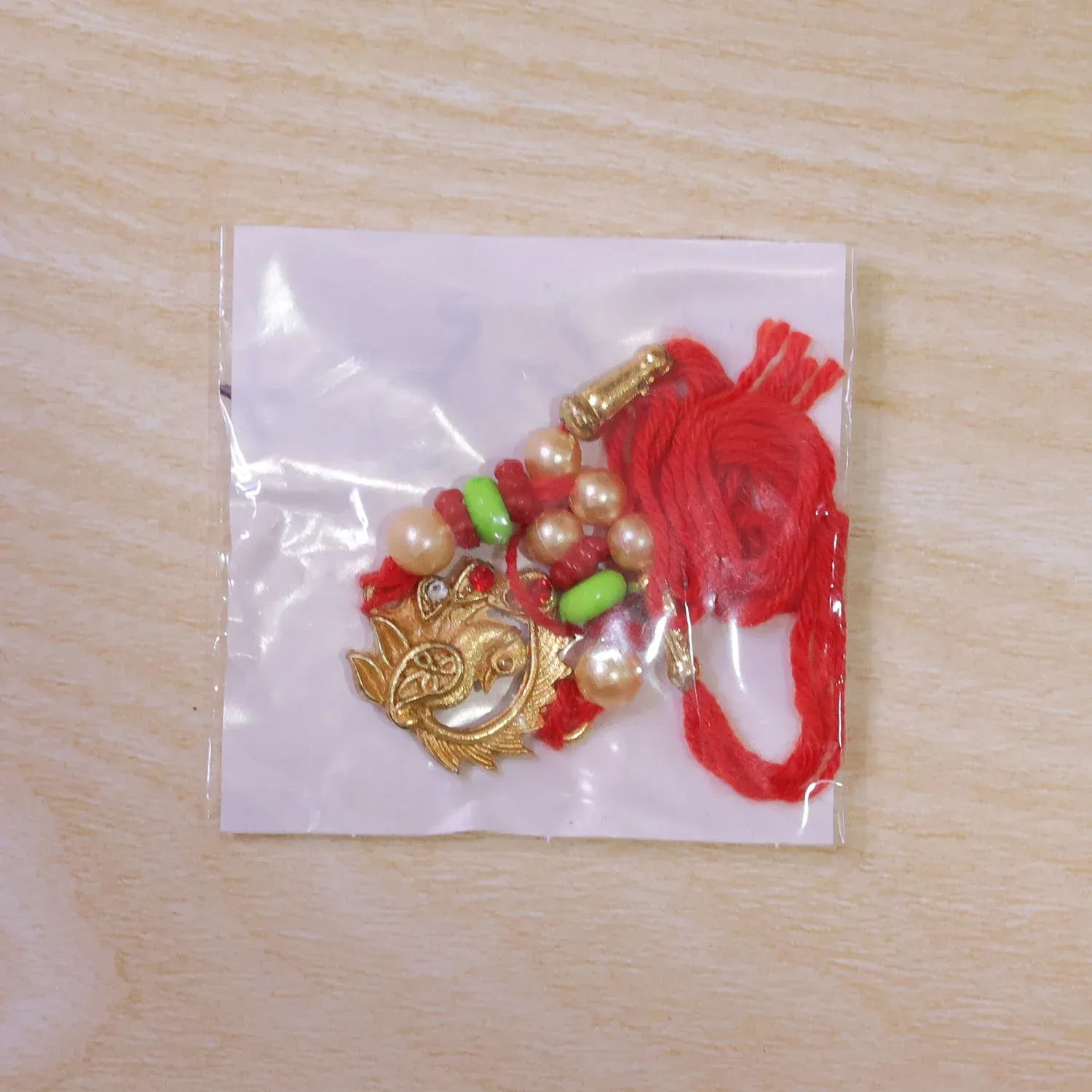 Elegant Peacock Design Rakhi with Pearl Beadwork Rakhi for Brother - Detailed Feature View 5