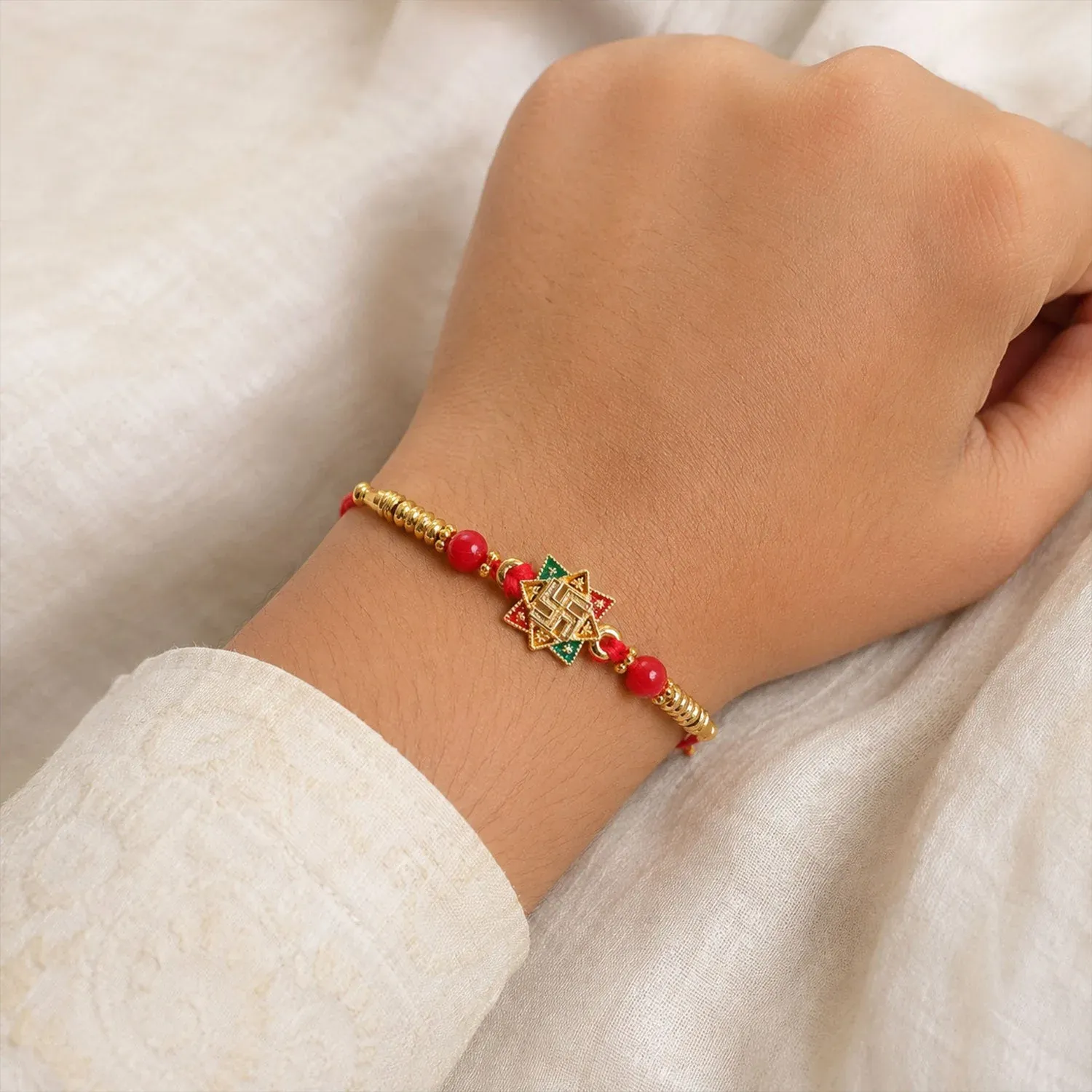Golden Swastik Motif Rakhi with Enamel & Beadwork – Rakhi for Brother - Detailed Feature View 3