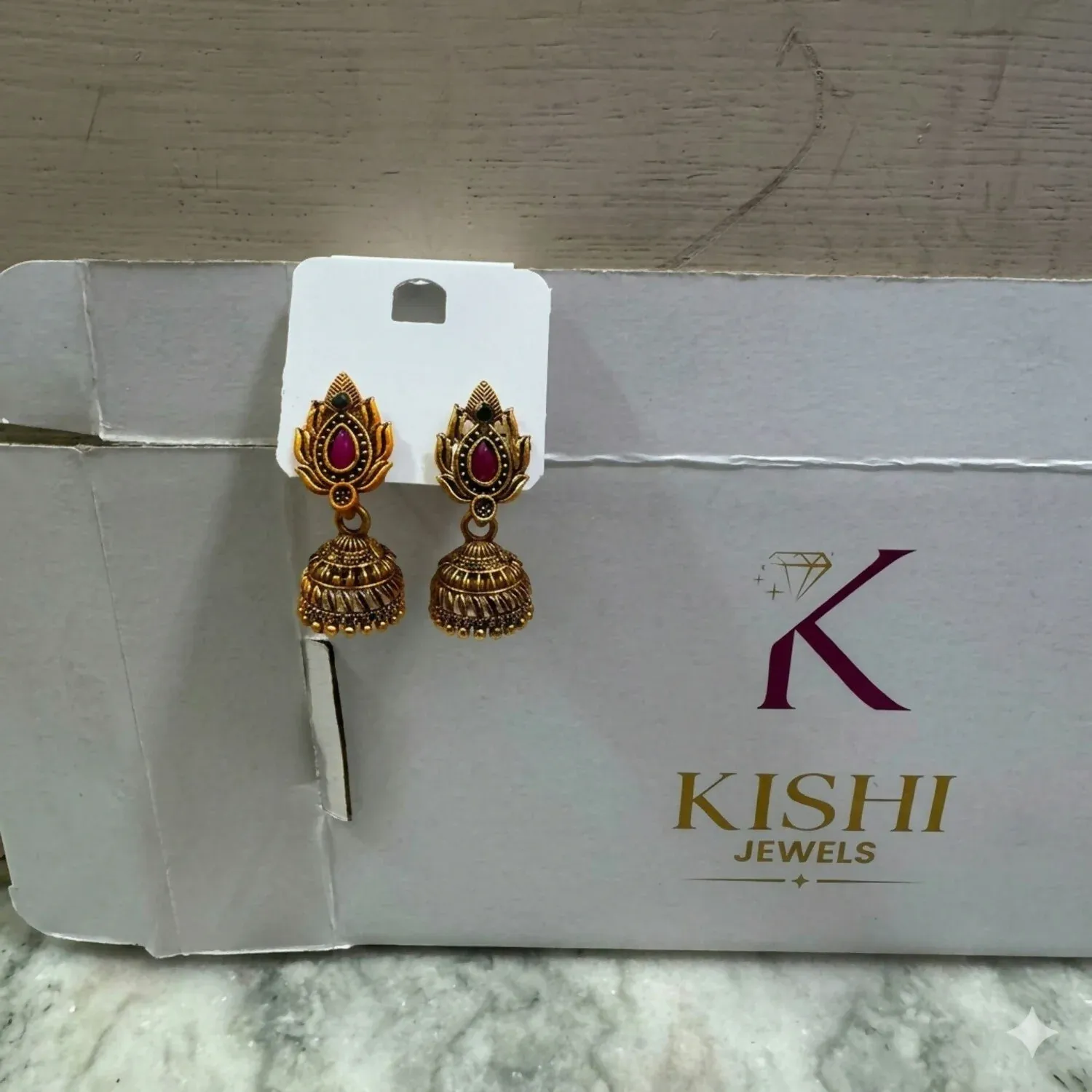 Antique Gold-Plated Matte South Indian Temple Jhumka Earrings with Ruby Leaf Stud - Detailed Feature View 3