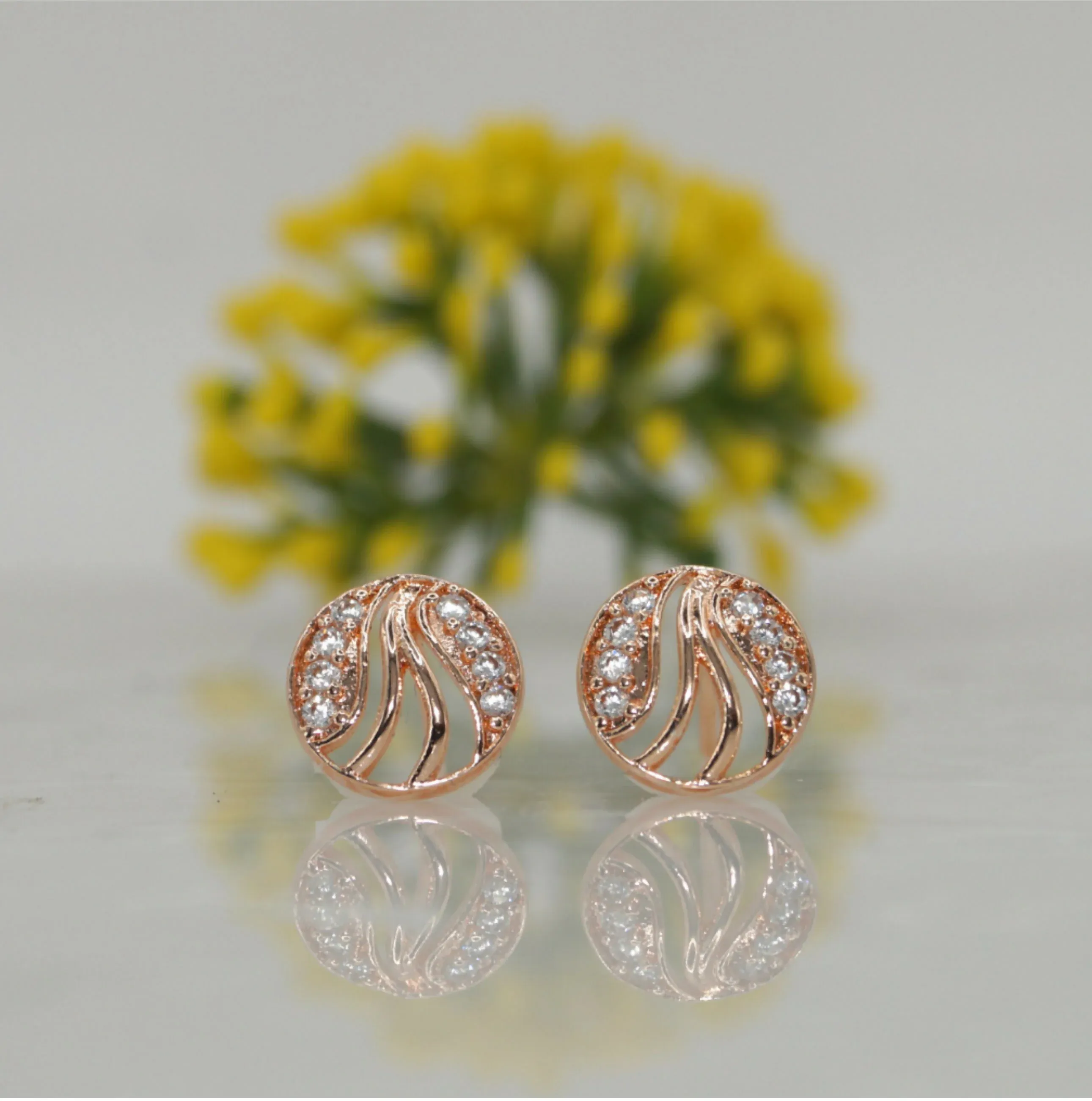 Premium Rose Gold Swirl Stud Earrings – Elegant Cubic Zirconia Sparkle - Buy Online at Alikart