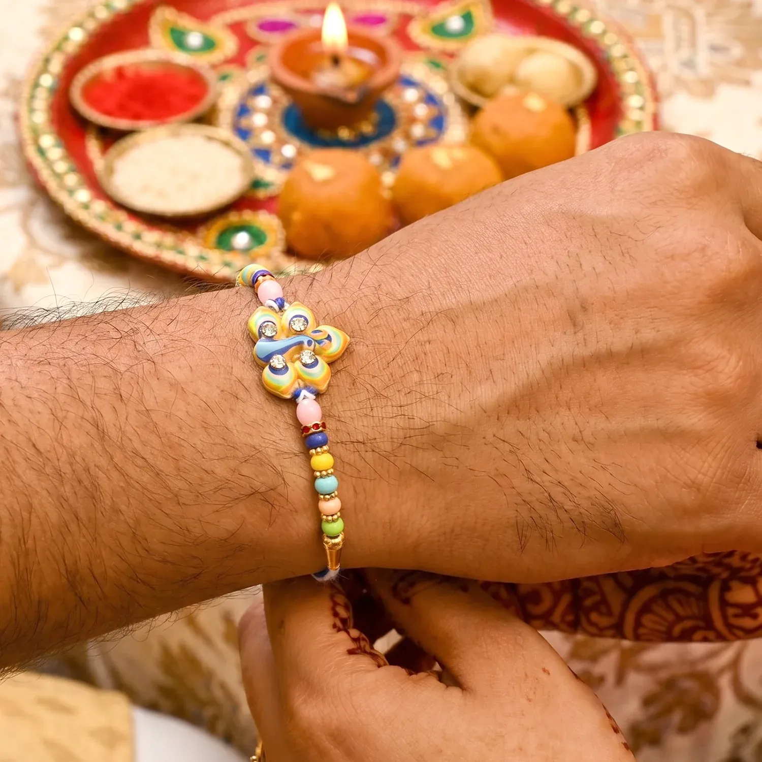 Rakshabandhan Peacock Feather Rakhi – Elegant Traditional Design - Detailed Feature View 1
