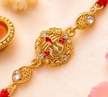 Gold-Toned Trishul Rakhi with Red Stones, Clear Crystal Accents & Designer Red Thread