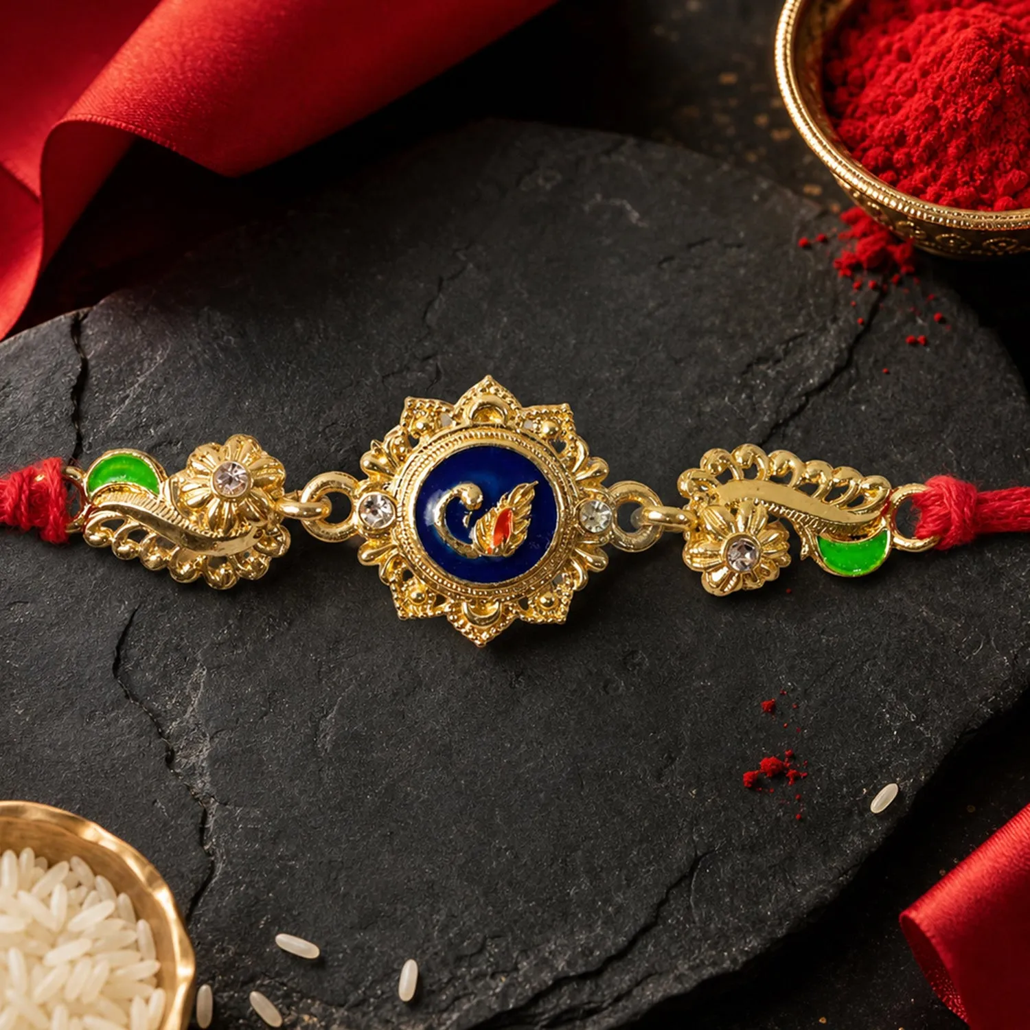 Ornate Rakhi showcasing Blue Oval Medallion, metal trims and chain look for Gift Use - Detailed Feature View 3