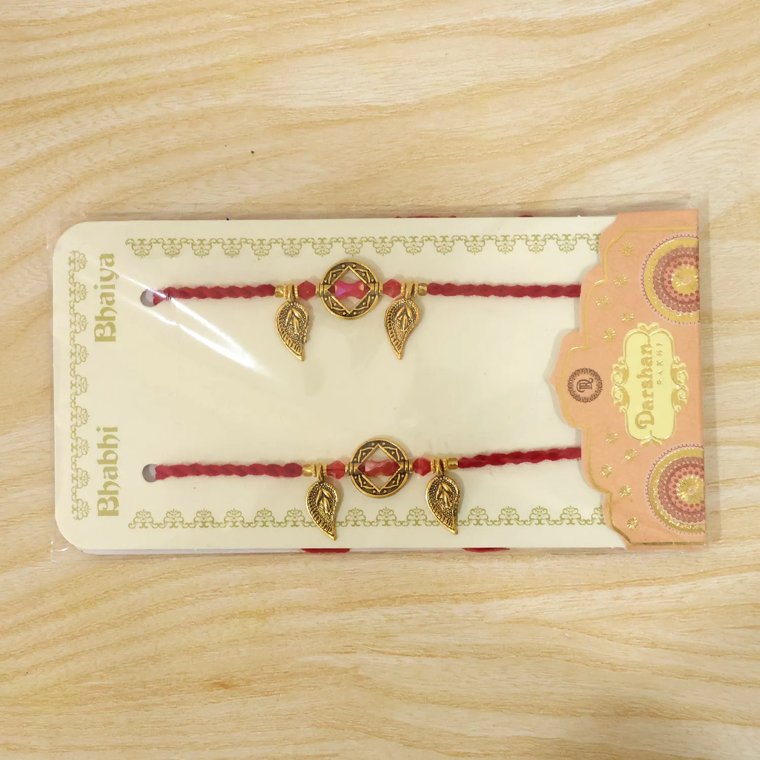 Classic Geometric Square Bhai Bhabhi Rakhi with Gem Center and Leaf Charms for Gift - Detailed Feature View 5