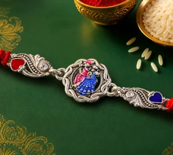 Silver-Toned Radha Krishna Rakhi with Colorful Enamel, Crystal Accents & Designer Red Thread