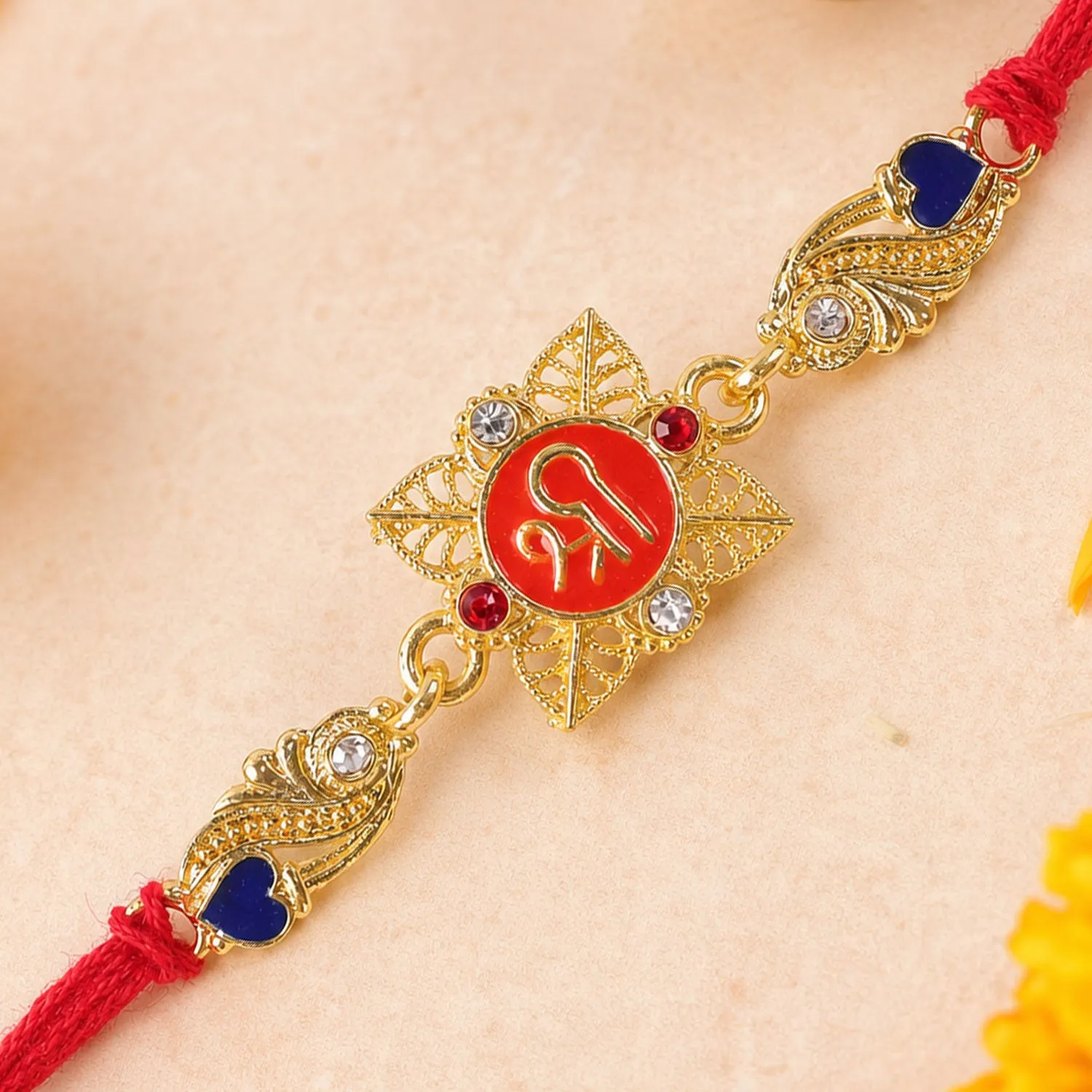 Festive Rakhi featuring Shri Plaque, leaf detail and thread style for Product Display - Detailed Feature View 3