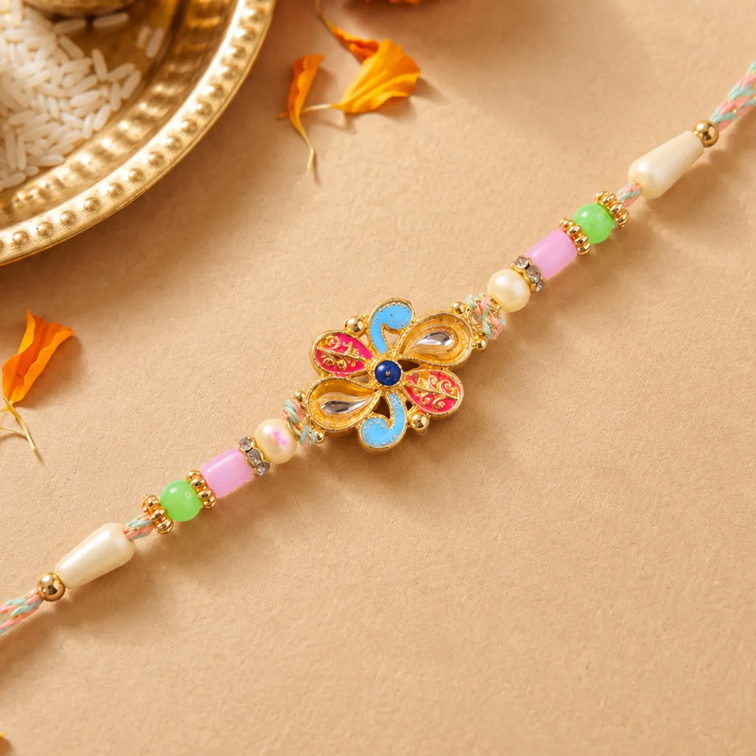 Premium Ornate Rakhi featuring Petal Blossom Charm and bead line in gift style for Gift Use - Buy Online at Alikart