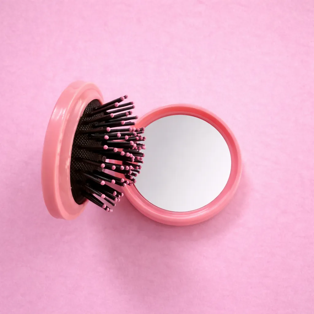 Premium Foldable Hair Brush – Compact Travel Comb with Built-In Mirror - Buy Online at Alikart
