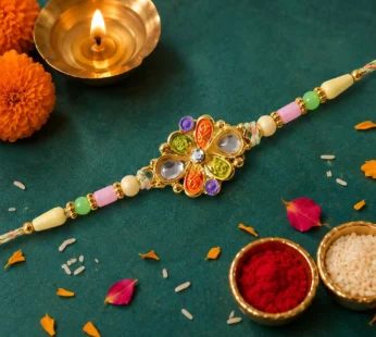 Orange and Green Enamel Flower Pendant Rakhi with Kundan Teardrop Stones