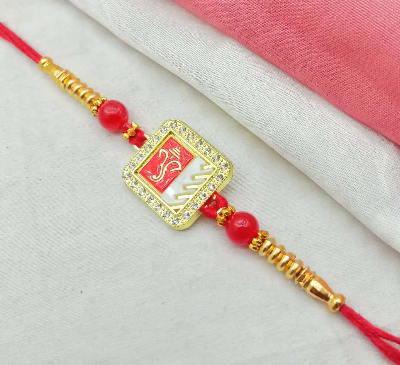 Spiritual Lord Ganesha Designer Rakhi for Brother with Rhinestone Border & Dual-Tone Enamel Dial - Detailed Feature View 3