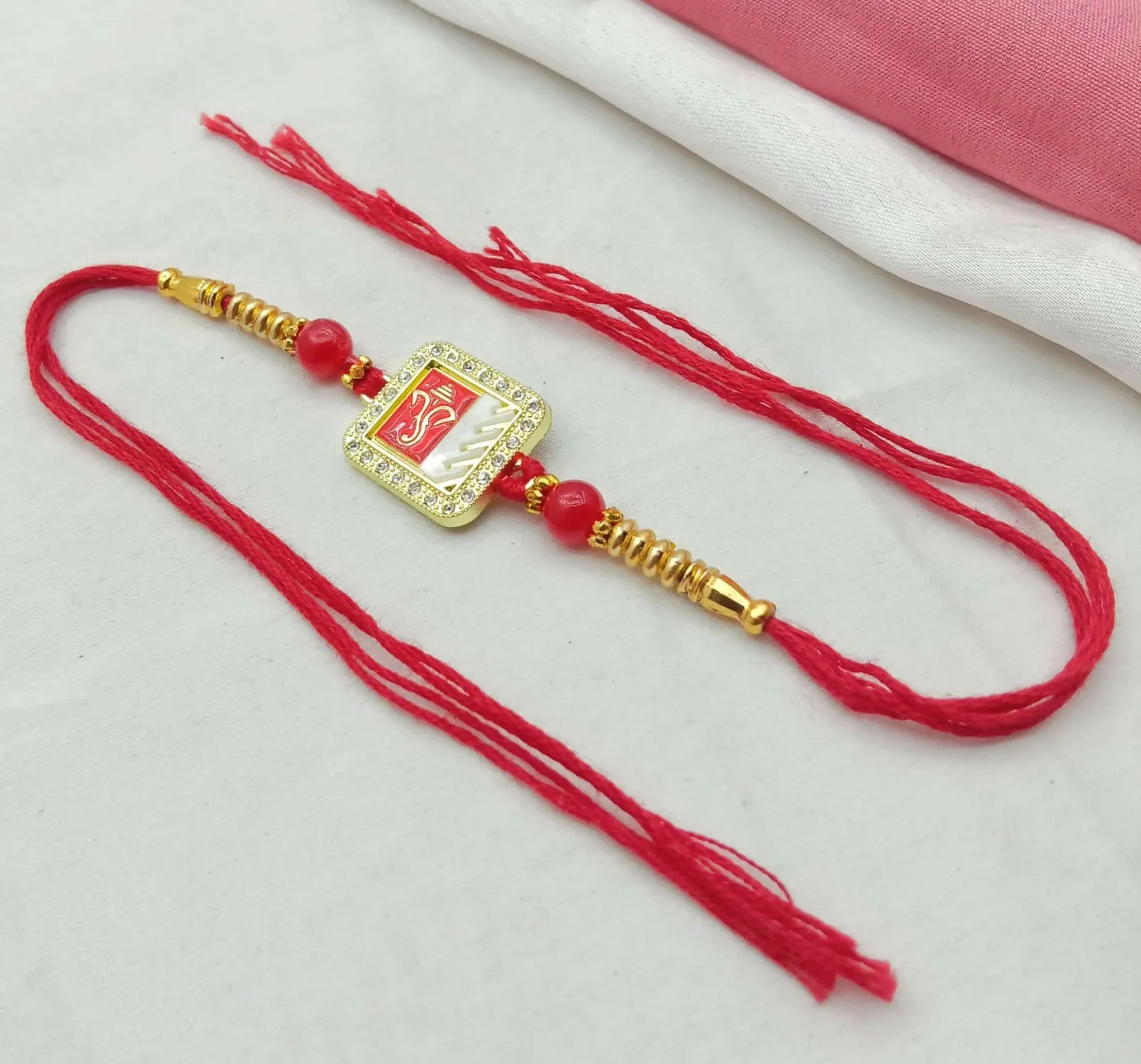 Spiritual Lord Ganesha Designer Rakhi for Brother with Rhinestone Border & Dual-Tone Enamel Dial - Detailed Feature View 4