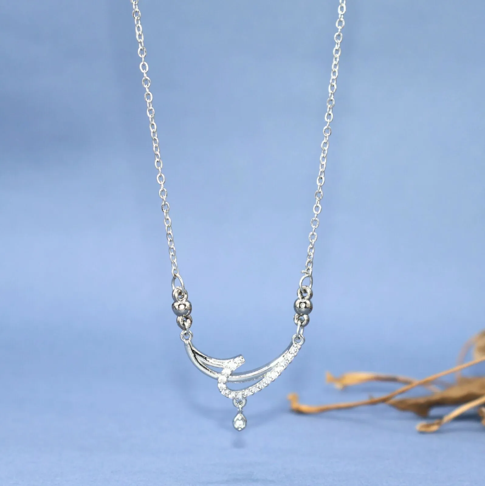 Crescent Curve Pendant Necklace – Elegant Silver Tone Design - Detailed Feature View 1