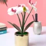 Premium White Artificial Orchid Flower With Golden Pot - Buy Online at Alikart