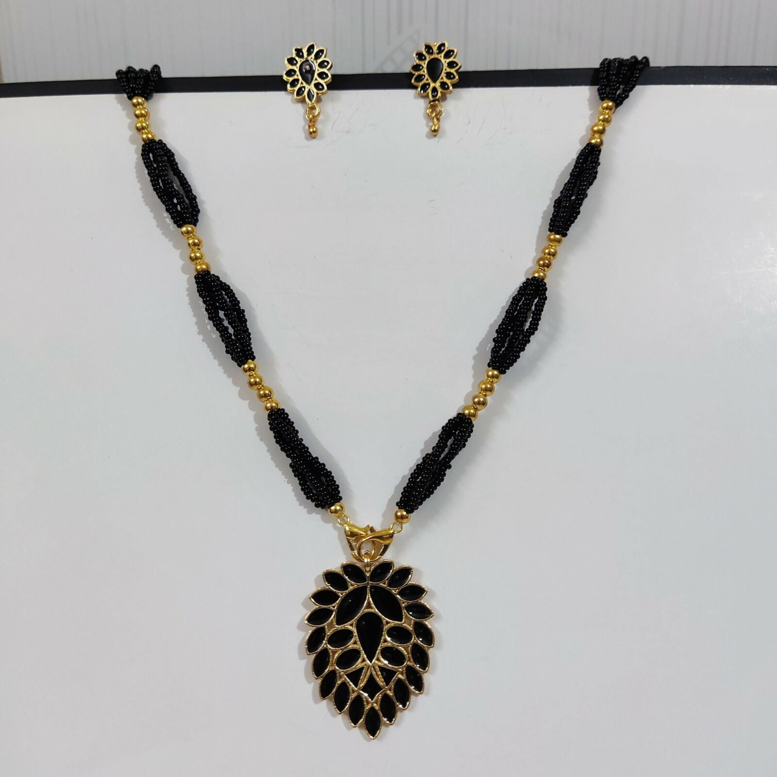 Black Beaded Necklace with Leaf Design Pendant & Matching Earrings for Women - Detailed Feature View 2