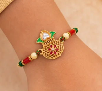 Classic Rakhi featuring Kalash Charm and red stone accents in chain look for Gift Use