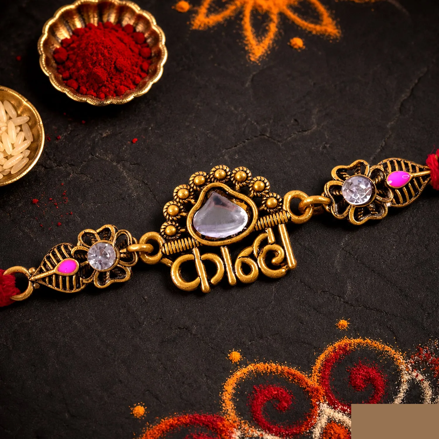 Antique Gold-Toned Kanha Rakhi with Kundan-Style Stone, Crystal Accents & Red Thread - Detailed Feature View 2